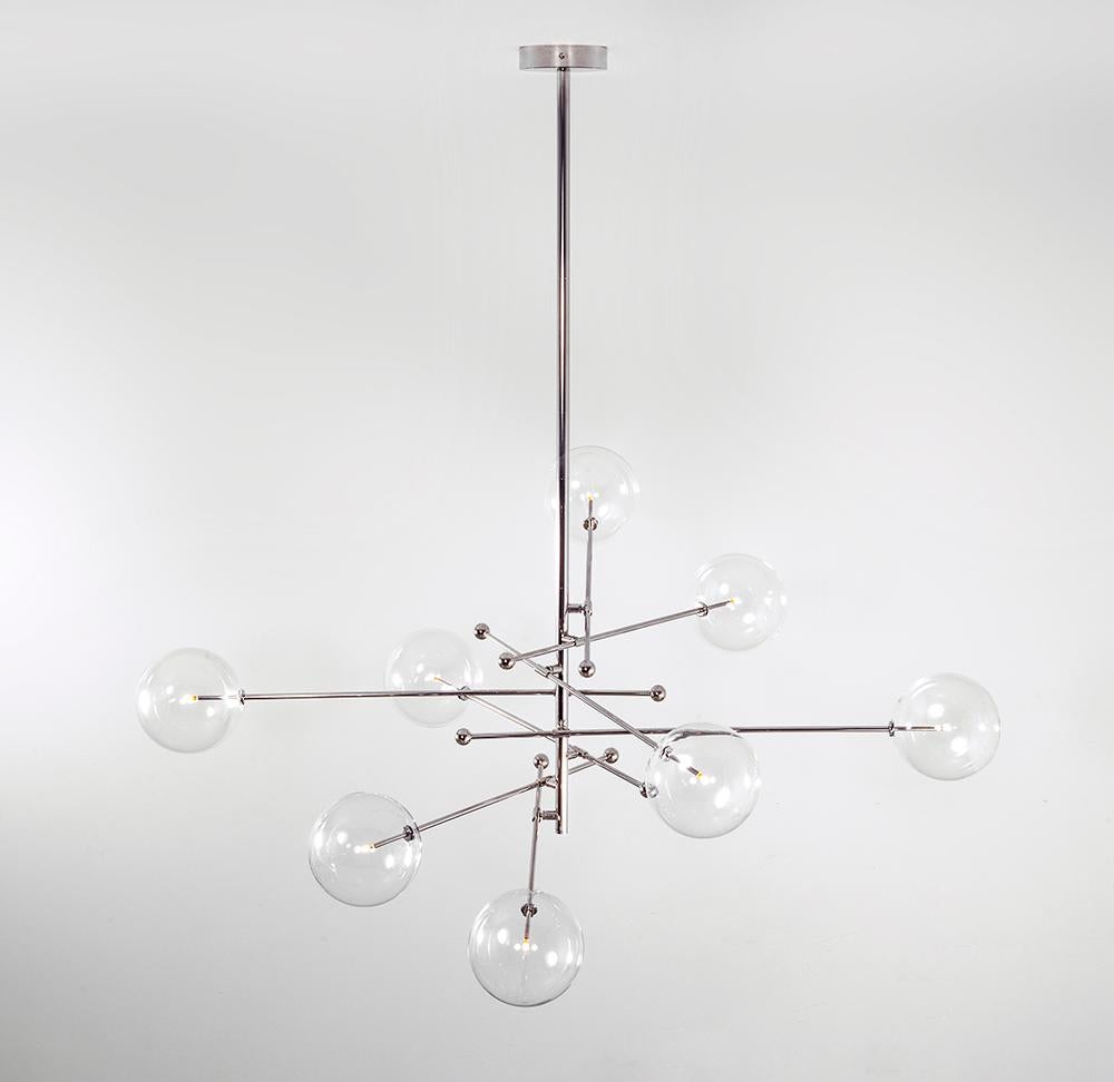 RD15 8 Arms Polished Nickel Chandelier by Schwung
Dimensions: Diameter 200.3 x H 180 cm 
Materials: Solid brass, hand-blown glass globes
Finish: Polished Nickel. 
Also available in finishes: Natural Brass or Black Gunmetal. 
All our lamps can
