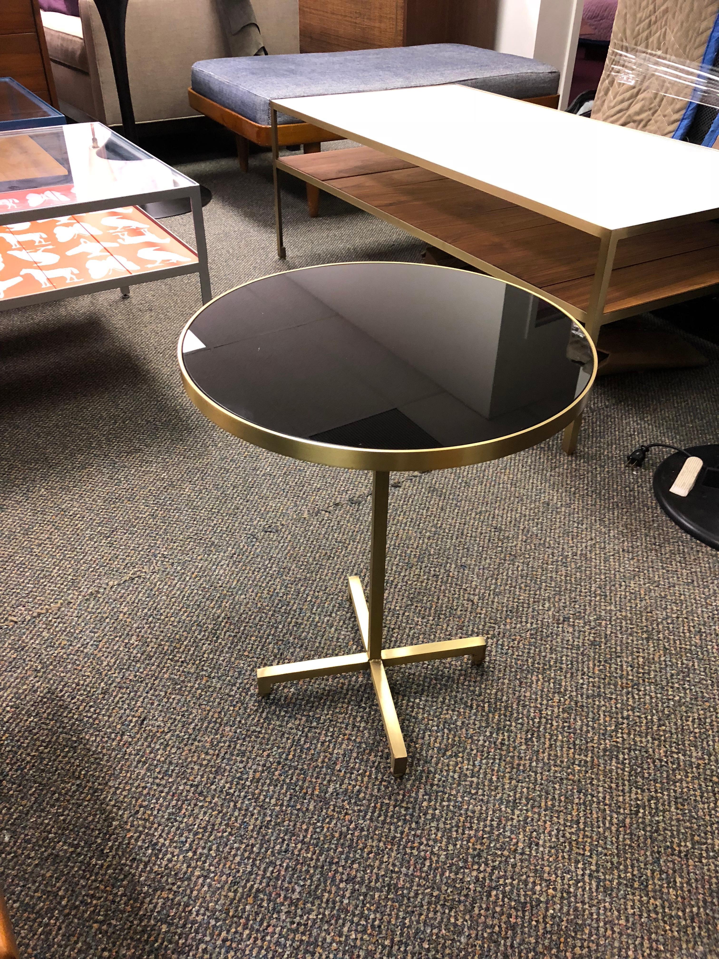Re: 205 brass side table with black mirror glass. 