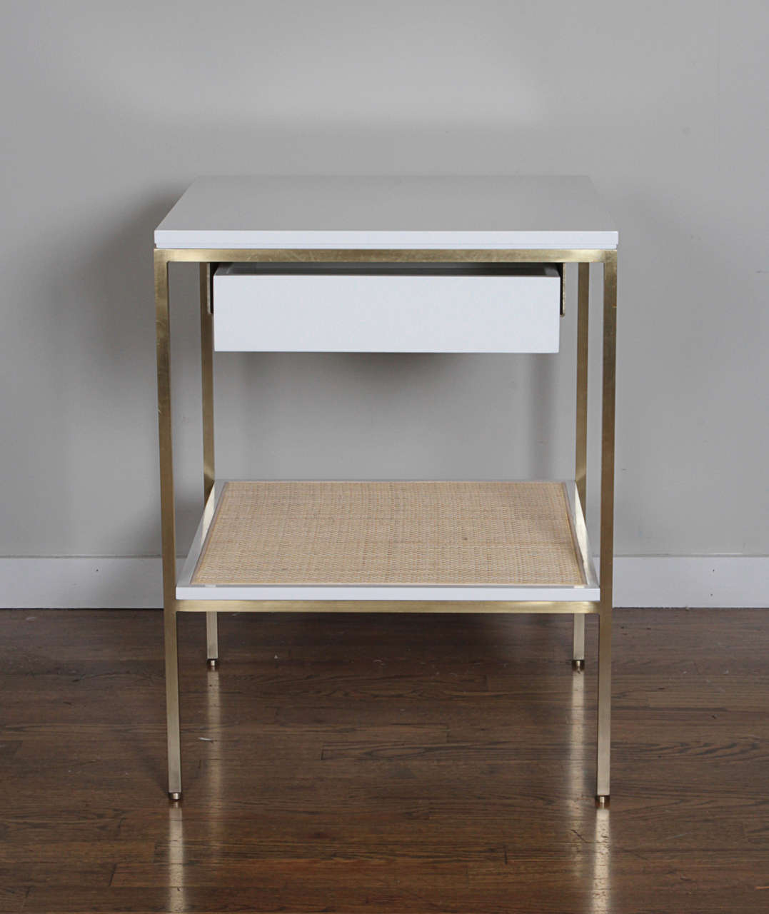 ReGeneration has been making bespoke furniture since the early 2000s. This pair of their signature, re: 392 lacquer and brass bedside tables are in stock in BM Soft chamois buffed lacquer on solid brass frames.