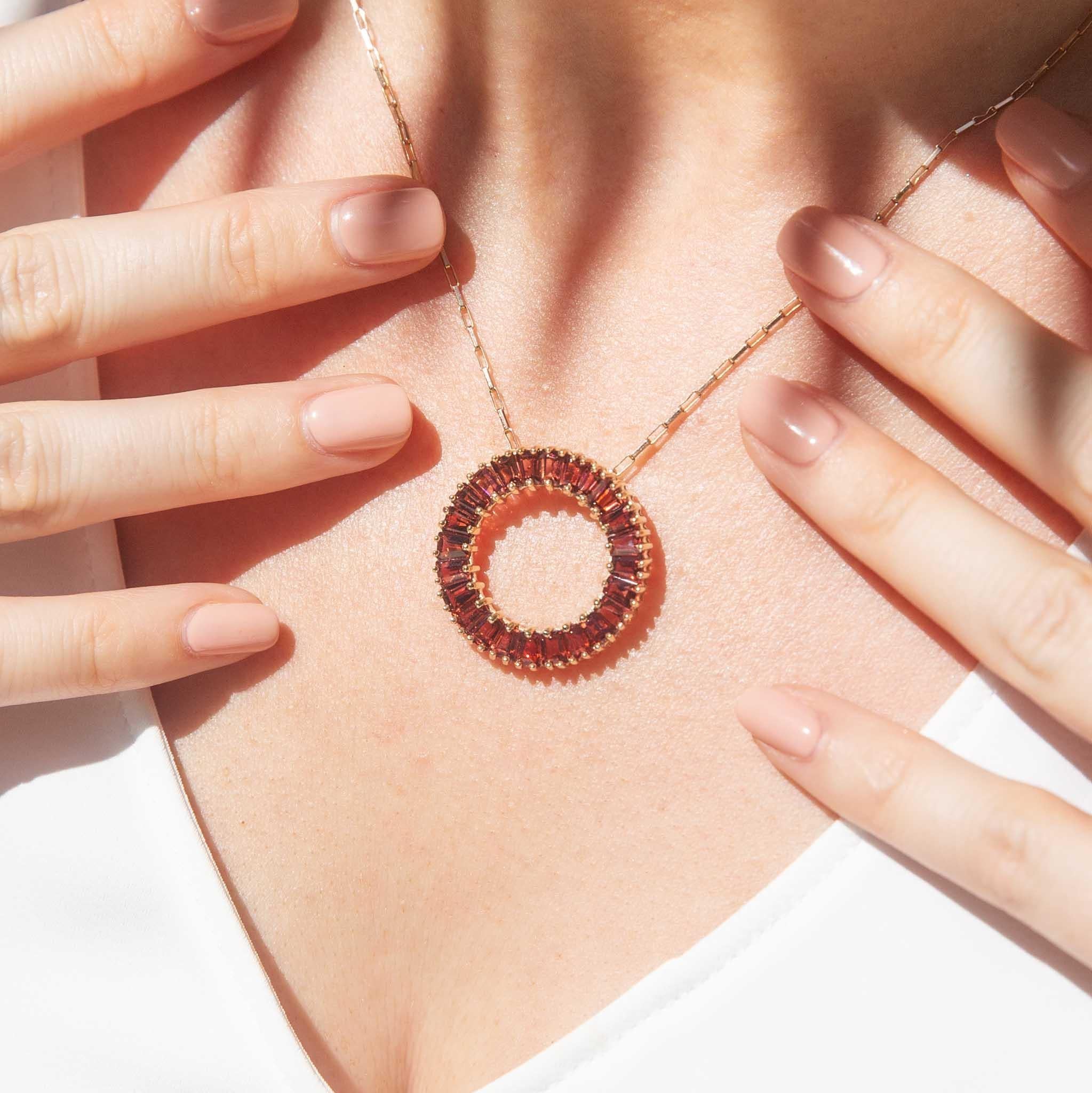 Beautifully crafted in 9 carat gold, The Cassandra Pendant is a celebration of colour.  Set in a golden halo her auburn garnets flash with copper lights that dance and move as you do.  She is a stunningly vibrant adornment.

The Cassandra Pendant &
