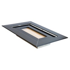 Tavolino Re Quadro di Paolo Piva in travertino e legno laccato
