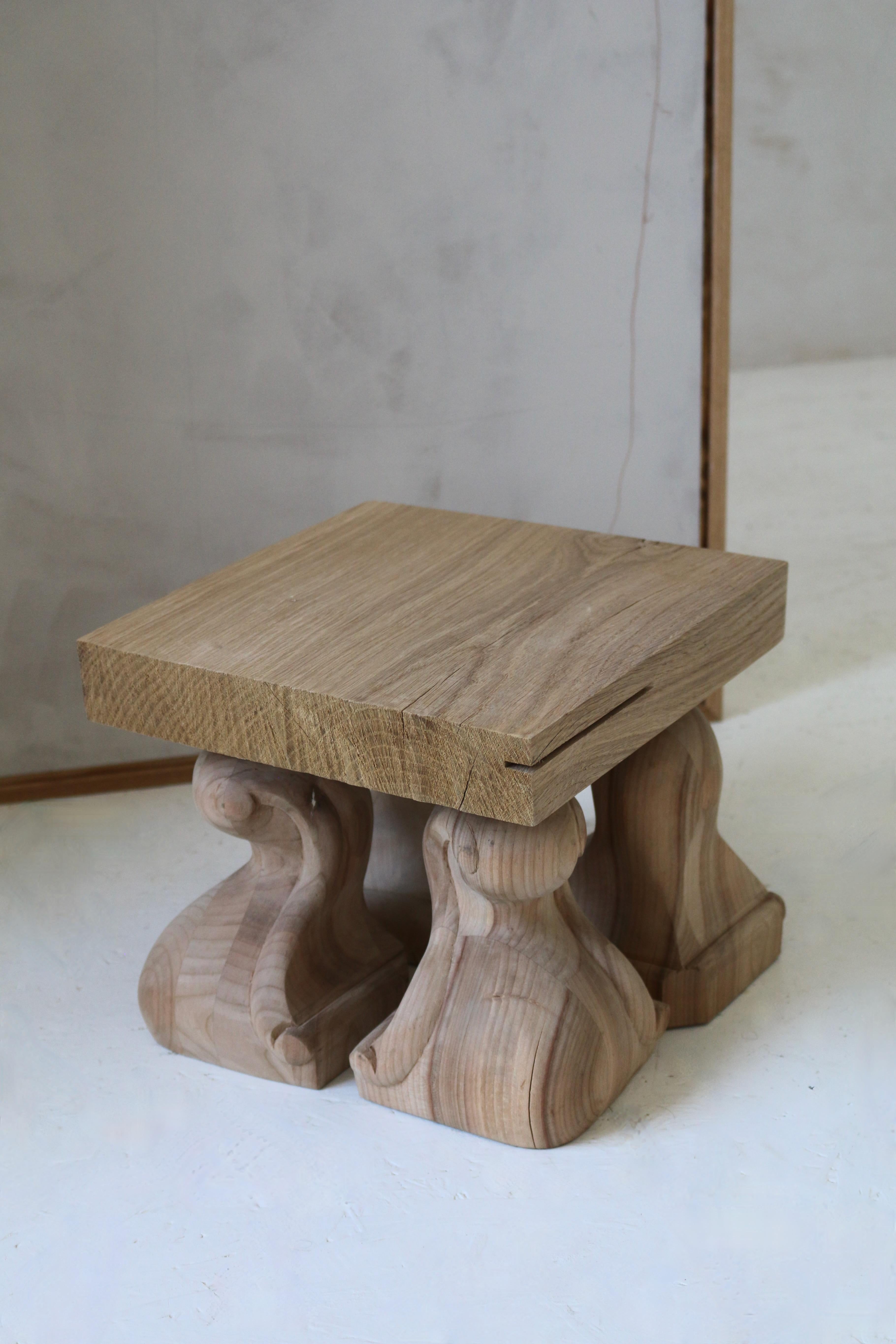 ART WITH FUNCTION. 

Re:02 raw sculpted wood side table  is a part of latest set of works by Experimental named  Re:Collection. 

Featuring hand 4 hand-carved feet and raw cut oak top, this object offers a feeling as just being assembled in a