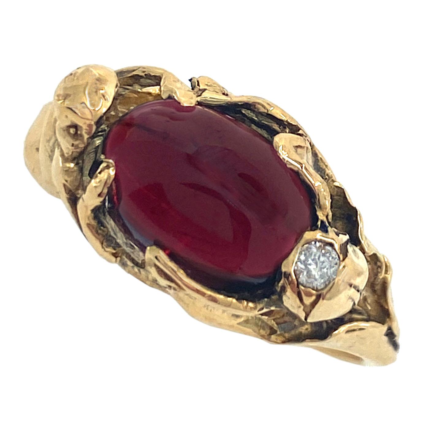 This one-of-a-kind ring was made by Eytan Brandes with naturalistic Art Nouveau jewelry in mind, but it's more abstract and contemporary.  

The deep oxblood red garnet is held in place by a tulip on one side and a reclining lady on the other, and
