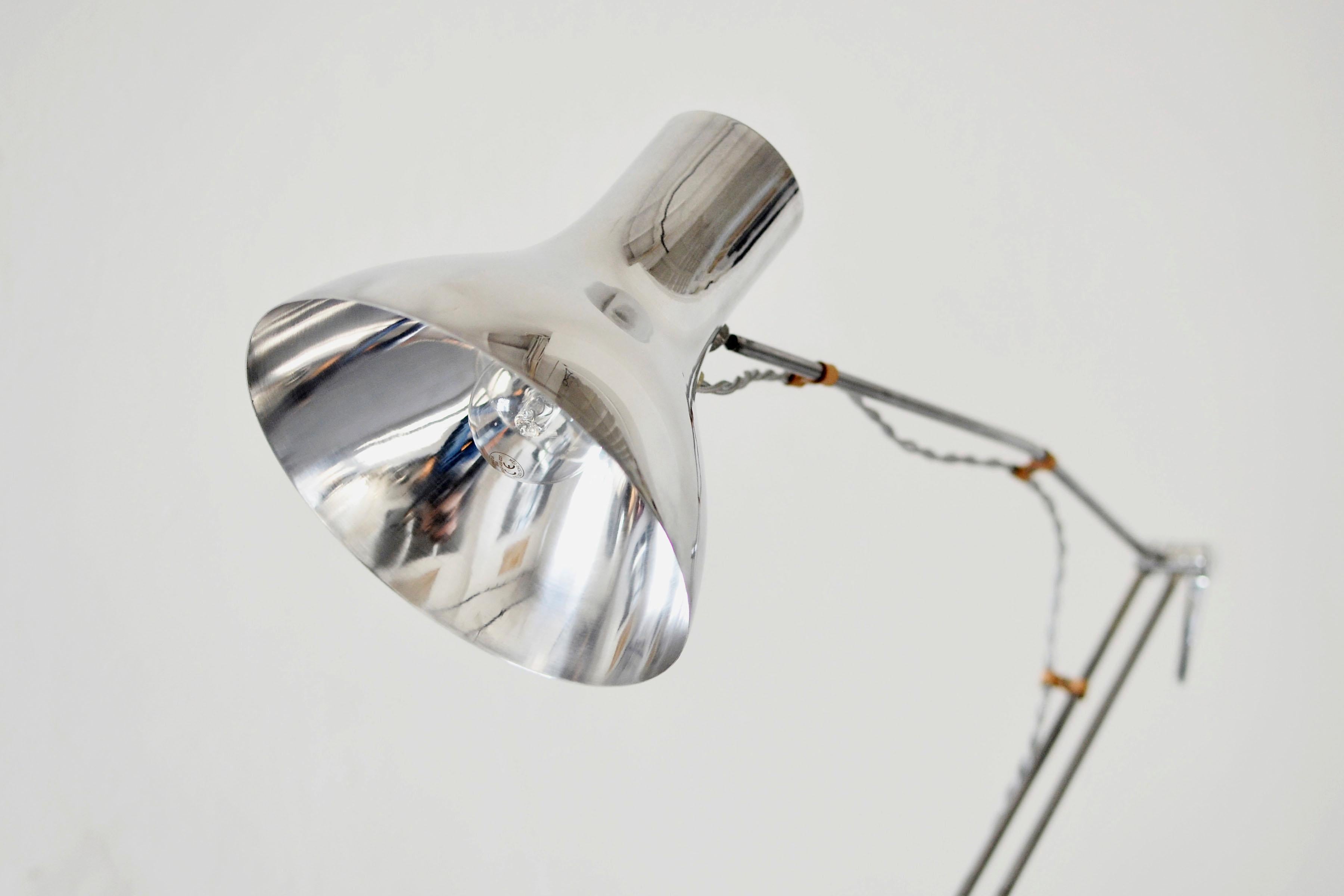 Original transformation of the very popular subtle airy desk lamp from the bohemian designer Josef Hurka. The light was fitted to the minimalistic wooden pedestal. The slim birch legs meeting in a node made from oak wood. The metal part can be