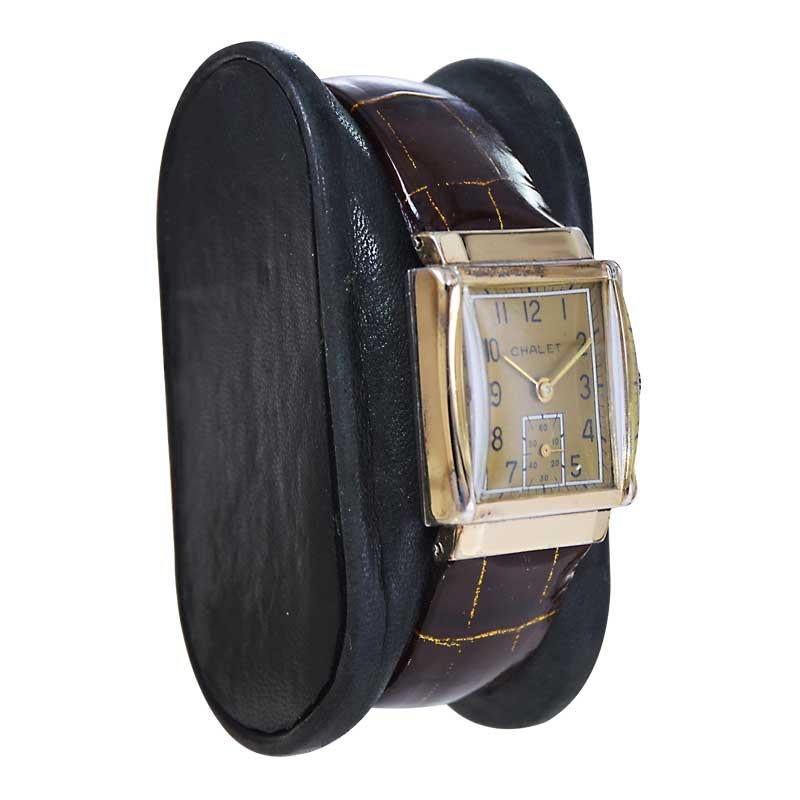 FACTORY / HOUSE: Chalet Watch Company
STYLE / REFERENCE: Art Deco Tank 
METAL / MATERIAL: Yellow Gold Filled 
CIRCA / YEAR: 1940's
DIMENSIONS / SIZE: Length 34mm X Width 22mm
MOVEMENT / CALIBER: Manual Winding / 17 Jewels 
DIAL / HANDS: Original