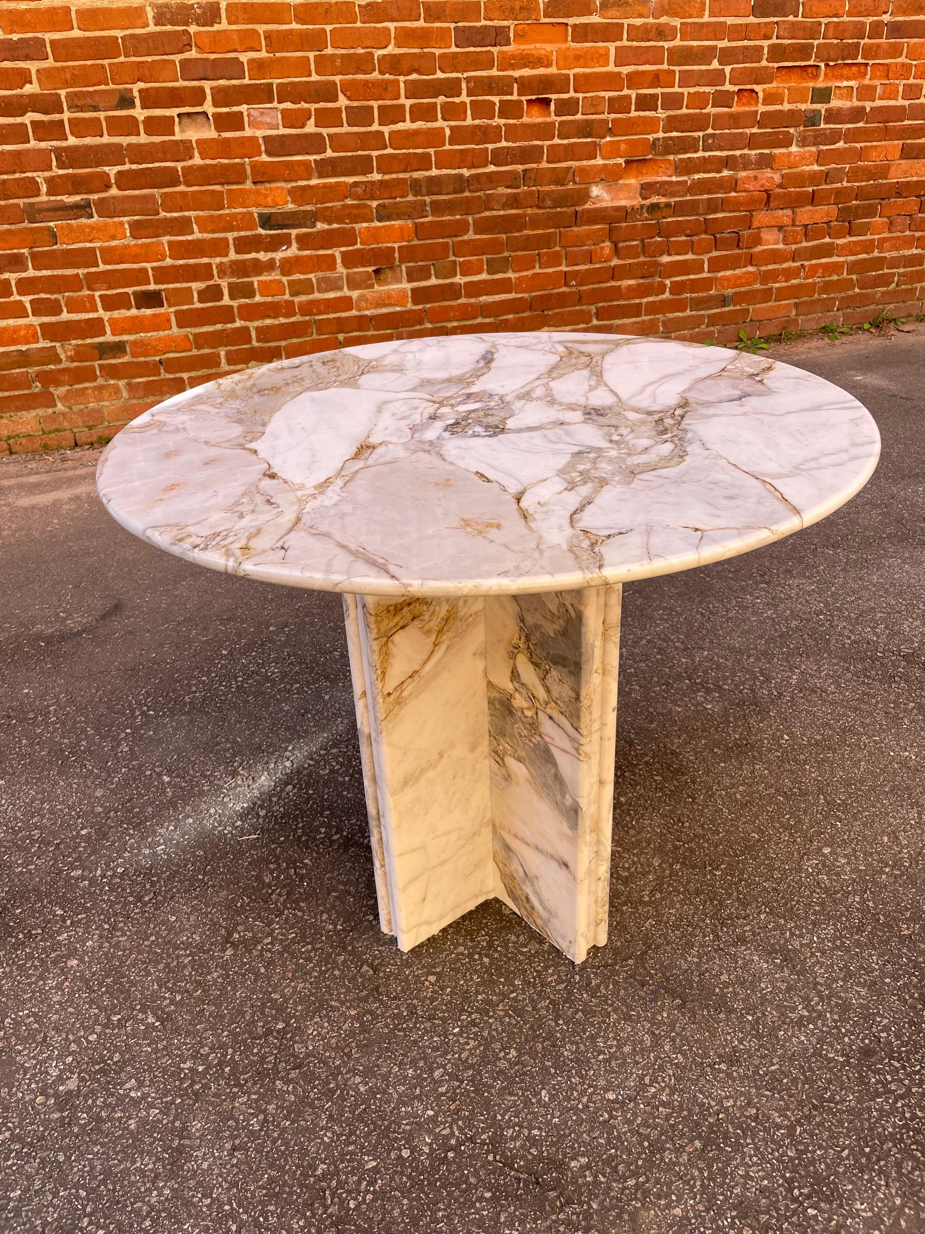 Built and ready to ship! Our custom Calacatta Gold natural Italian marble center / breakfast / game table of two centimeters thick Italian Calacatta marble fabricated in an early 20th Century Modernist architecture. We epoxy-mesh the underside of