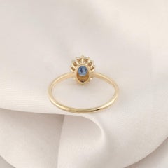 Real 0.60 Carat Blue Sapphire 0.14 Carat SI/H Diamond Ring 14 Karat Yellow Gold