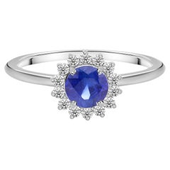 0.61 Ct Natural Blue Sapphire 0.14Ct Diamond Halo Ring in 18K White Gold
