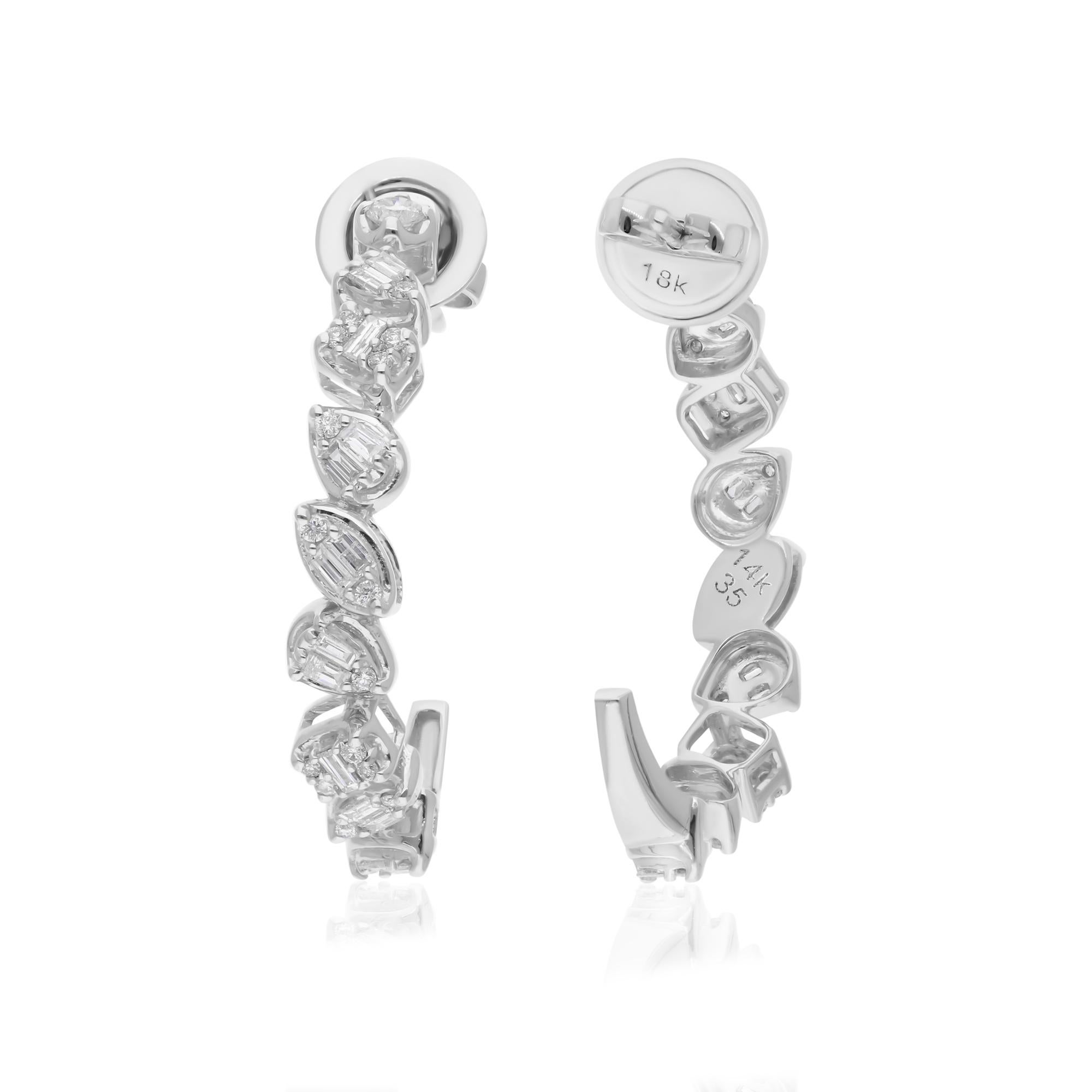 Realizzati in oro a 14 carati, questi squisiti orecchini sono impreziositi da 0,76 carati di diamanti scintillanti.

Segui la vetrina di Spectrum Jewels per vedere le ultime collezioni e i pezzi esclusivi. Spectrum Jewels è orgoglioso di essere