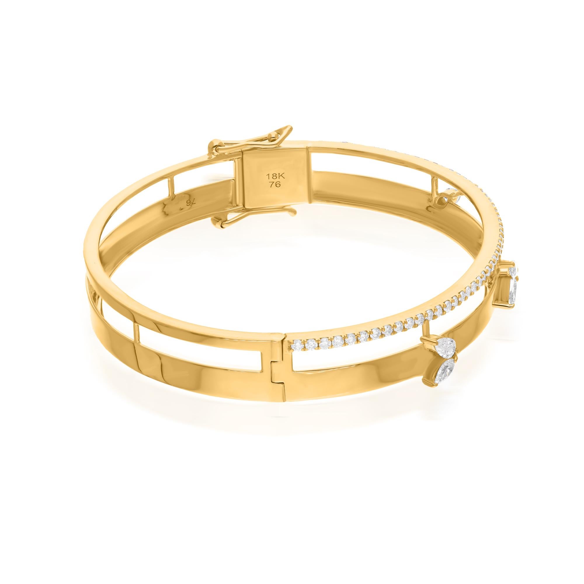 The 14 Karat Yellow Gold setting serves as the perfect backdrop, enhancing the beauty of the diamonds with its warm glow and luxurious finish. Expertly crafted links ensure a comfortable fit and effortless wear, while adding a touch of