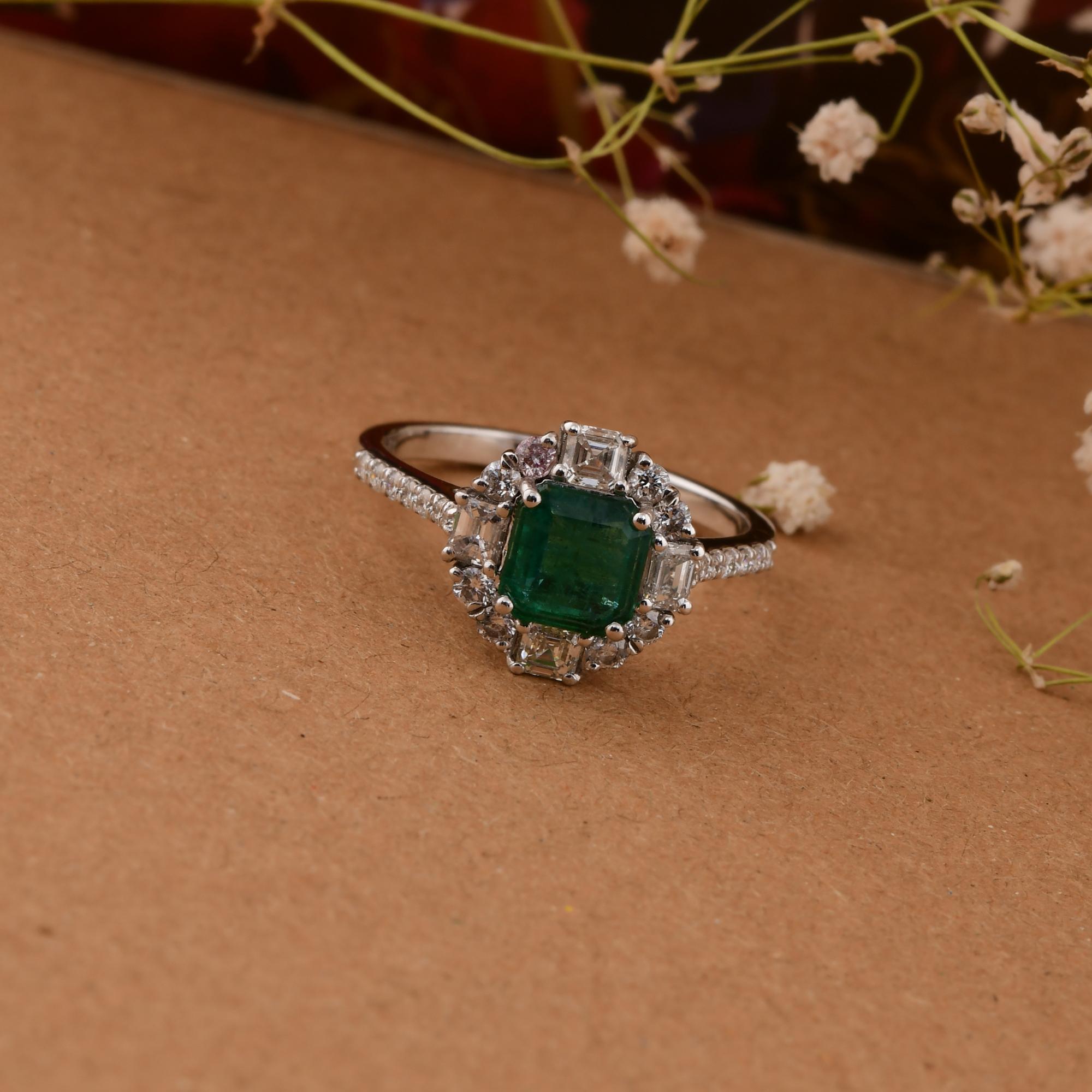 Cast from 14-karat gold, these exquisite ring is handset with 1.05 carats Zambian emerald and 0.82 carats of sparkling diamonds.

The ring is a size 7 US and may be resized to larger or smaller upon request. FOLLOW SPECTRUM JEWELS storefront to view