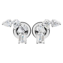 Boucles d
oreilles en or blanc 18 carats avec un vrai diamant de 1.11 carat SI Clarity HI Color