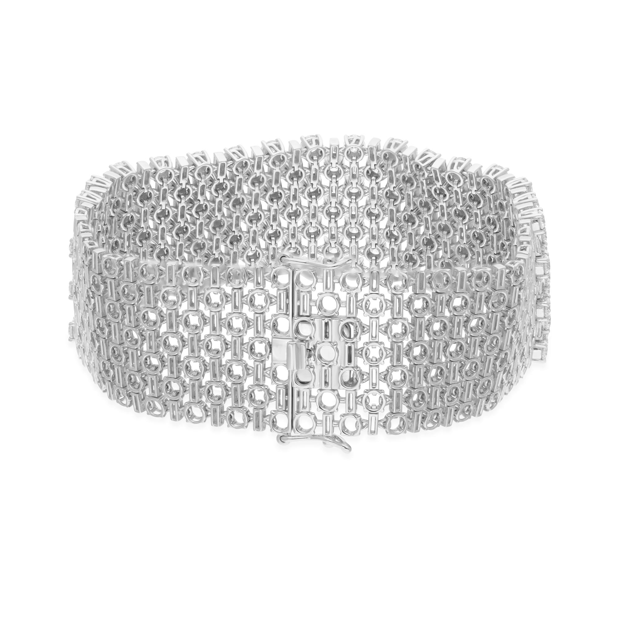 Cast from 18-karat gold, these exquisite bracelet is handset with 12.05 carats of sparkling diamonds.

FOLLOW SPECTRUM JEWELS storefront to view the latest collection & exclusive pieces. Spectrum Jewels is proudly rated as a Top Seller on 1stdibs