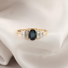 Real 1.24 Carat Blue Sapphire 0.25 Carat SI/H Diamond Ring 14 Karat Yellow Gold