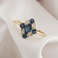 Real 1.25 Carat Blue Sapphire 0.11 Carat SI/H Diamond Ring 14 Karat Yellow Gold