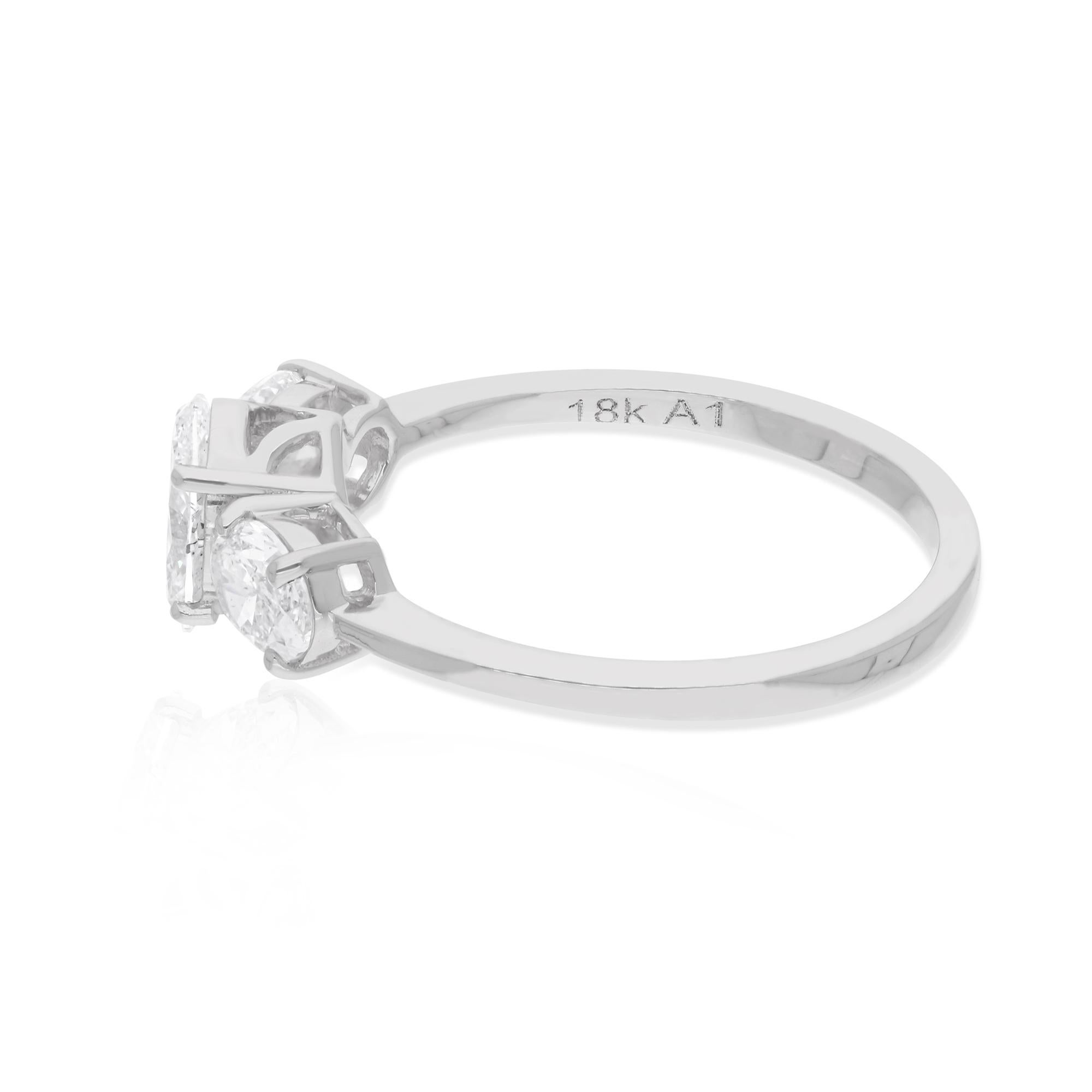 Celebrate eternal love with this exquisite 1.35 Ct Three Oval Diamond Wedding Ring, crafted with meticulous attention to detail in 18 Karat Solid White Gold. A timeless symbol of commitment and affection, this ring combines classic elegance with