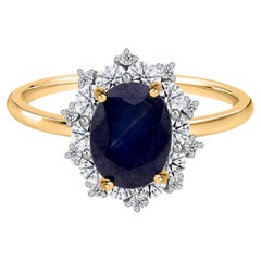 Real 1.48 Carat Blue Sapphire 0.62 Carat SI/H Diamond Ring 14 Karat Yellow Gold