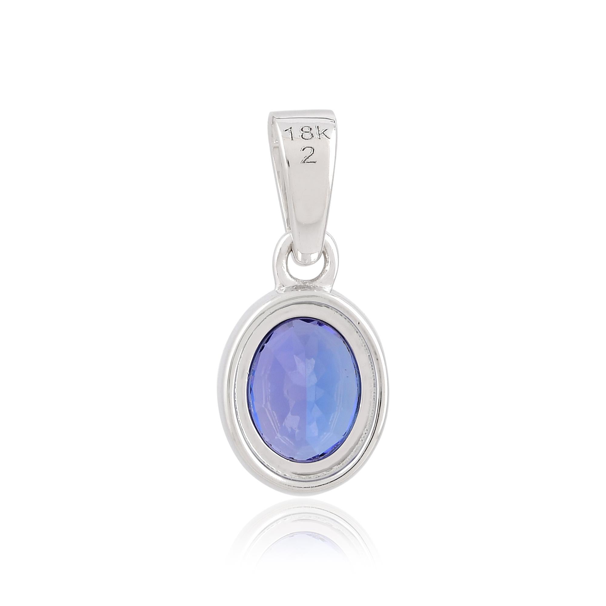 Elevate your jewelry collection with this exquisite oval-shaped tanzanite gemstone charm pendant, boasting a real carat weight of 1.82 carats. Meticulously handcrafted in 18 karat white gold, this pendant exudes elegance, sophistication, and a touch