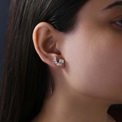 Pendientes de oro blanco de 18 quilates con diamantes talla esmeralda pera SI/H de 1,97 quilates reales
