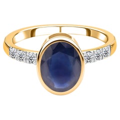 Real 2.42 Carat Blue Sapphire 0.21 Carat SI/H Diamond Ring 14 Karat Yellow Gold