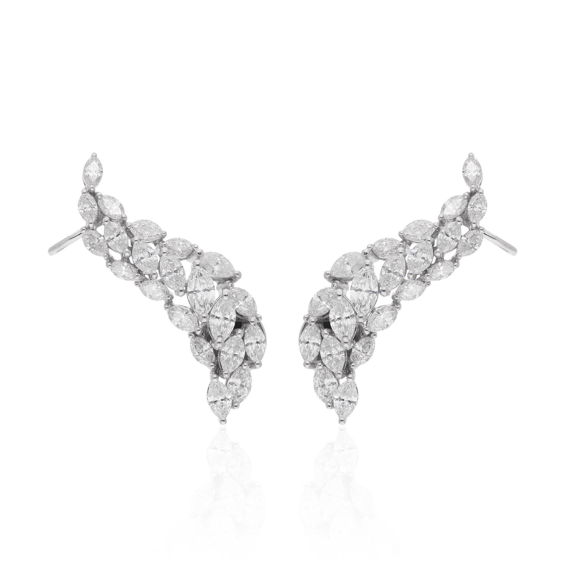 Crafted with precision and attention to detail, these earrings exemplify the highest standards of quality and craftsmanship. The lustrous 18 karat white gold setting provides the perfect backdrop for the dazzling marquise diamonds, ensuring they