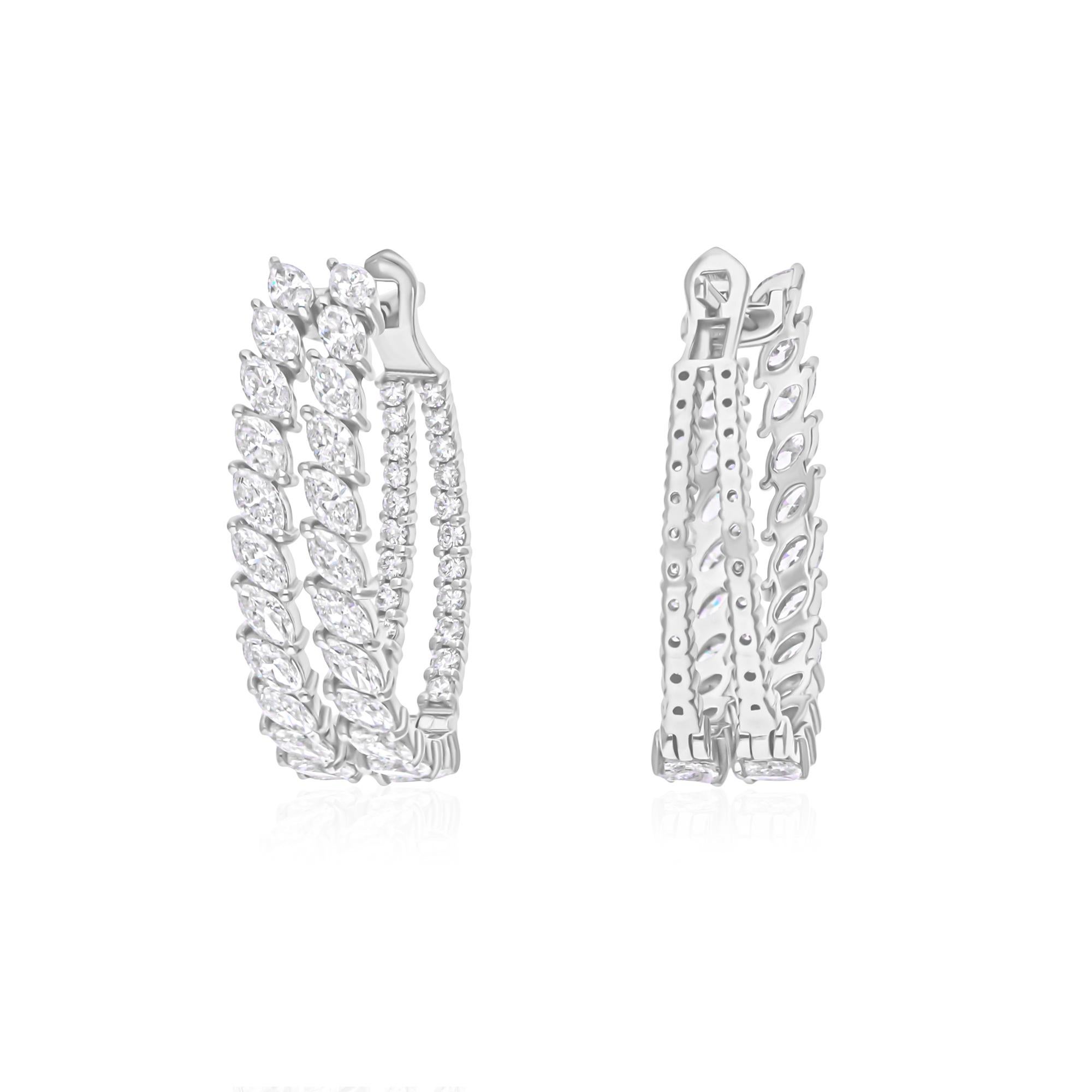 Coulées dans de l'or 18 carats, ces boucles d'oreilles exquises sont serties de 3,15 carats de diamants étincelants.

Suivez la vitrine de Spectrum Jewels pour découvrir la dernière collection et les pièces exclusives. Spectrum Jewels est fièrement