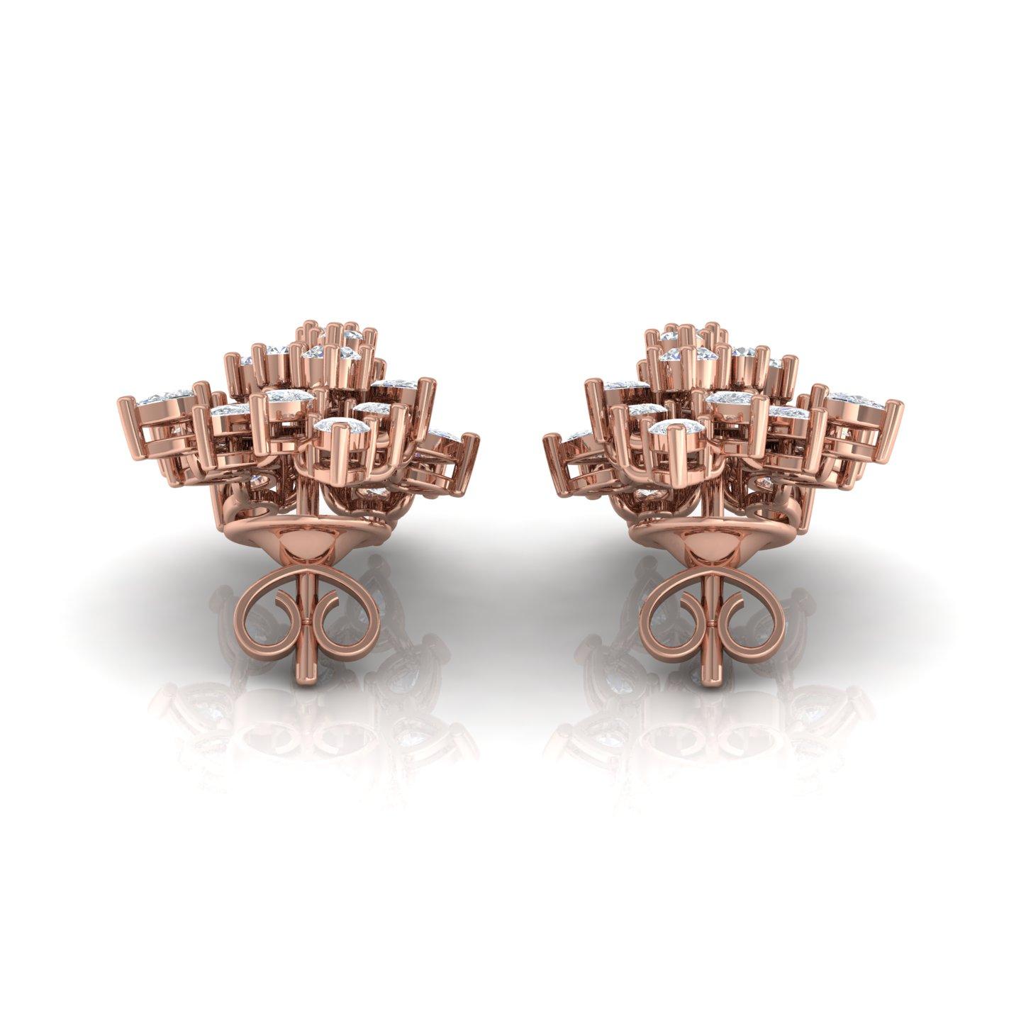 These stunning earrings feature 3.20 carats of natural diamonds, beautifully cut in a combination of pear and round brilliant shapes. Crafted in 18 karat rose gold with a total weight of 7.54 grams, including 6.90 grams of gold, these earrings exude