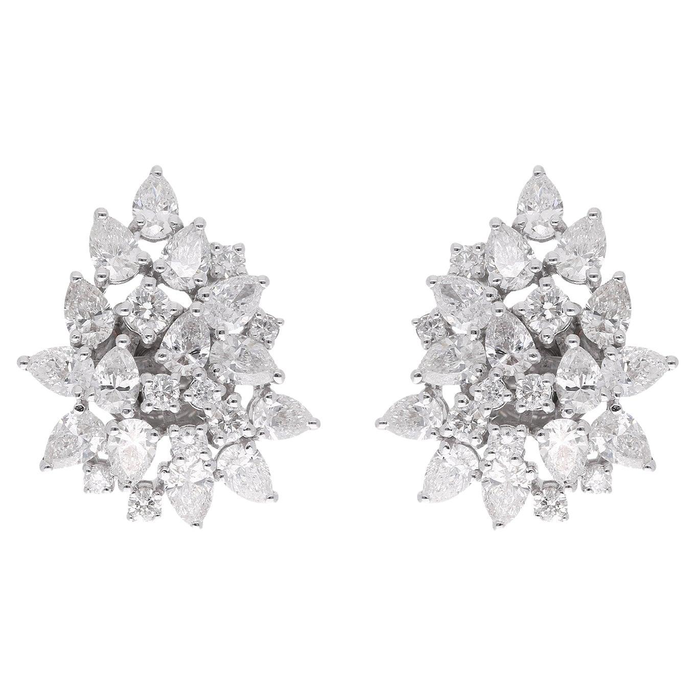 Boucles d
oreilles poire et diamant rond de 3.30 carats en or blanc 18 carats