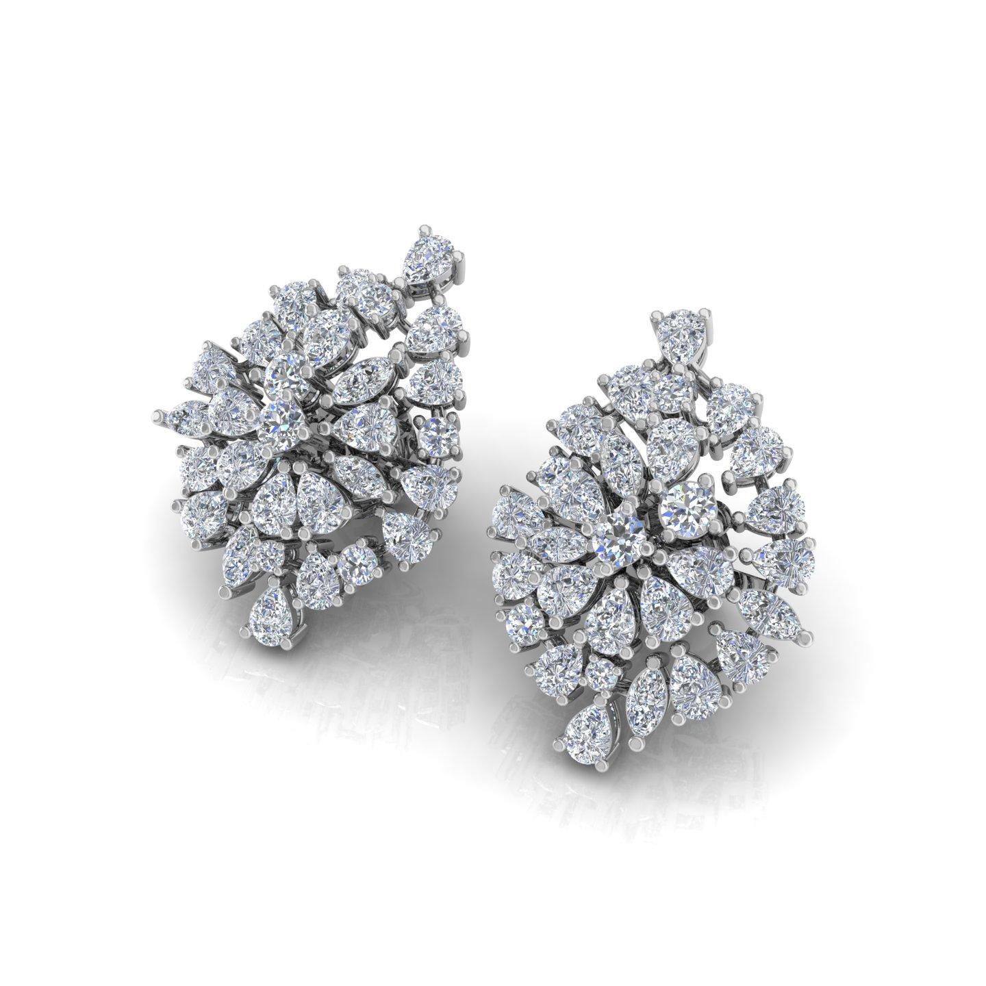 These dazzling cluster earrings feature a total of 4.2 carats of natural brilliant cut diamonds, arranged to create a captivating multi-diamond design. Crafted in luxurious 18 karat White gold, with a total weight of 9.74 grams including 8.90 grams
