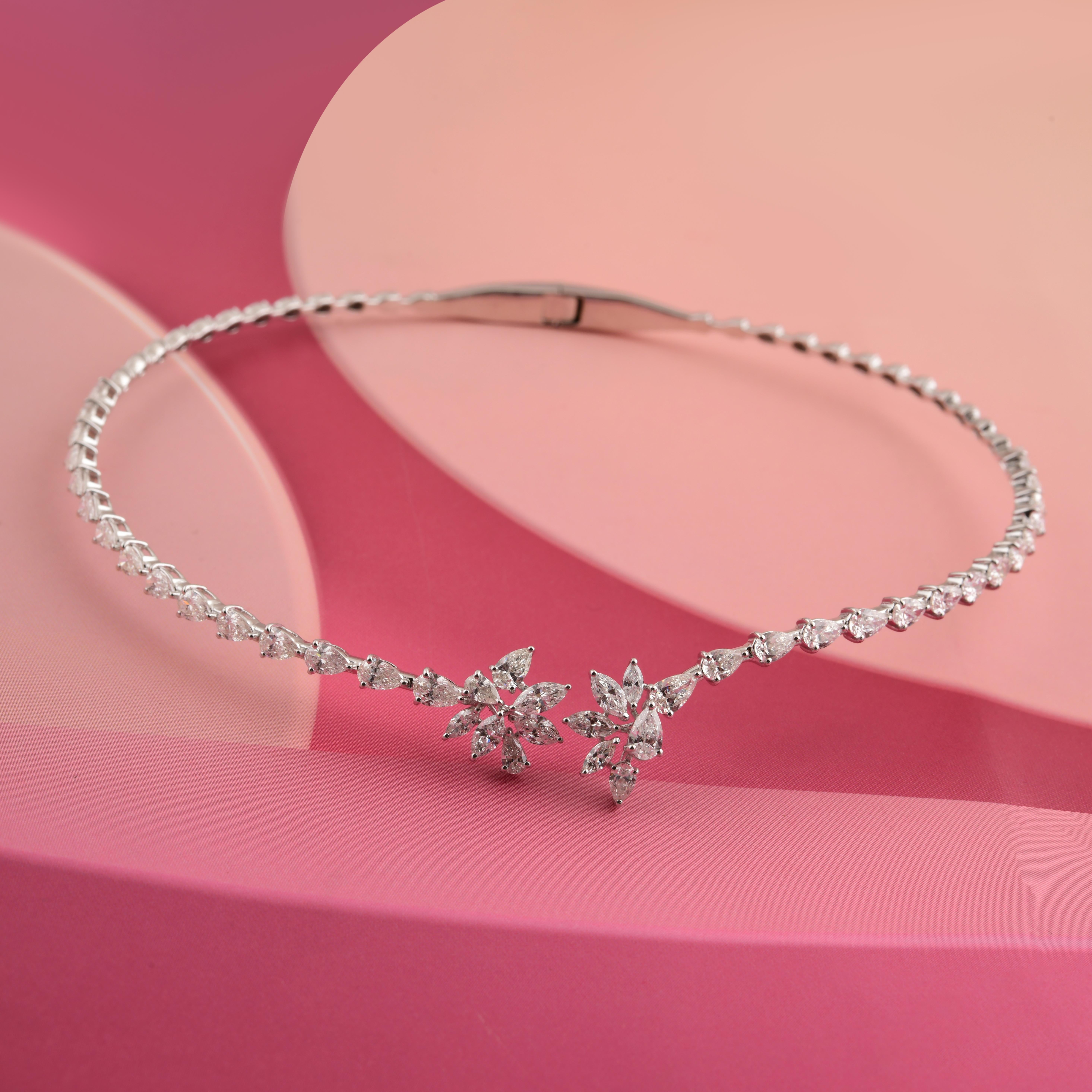 Fabriqué en or 14 carats, ce collier exquis est serti de 8,39 carats de diamants étincelants.

Suivez la vitrine de Spectrum Jewels pour découvrir la dernière collection et les pièces exclusives. Spectrum Jewels est fièrement classé parmi les