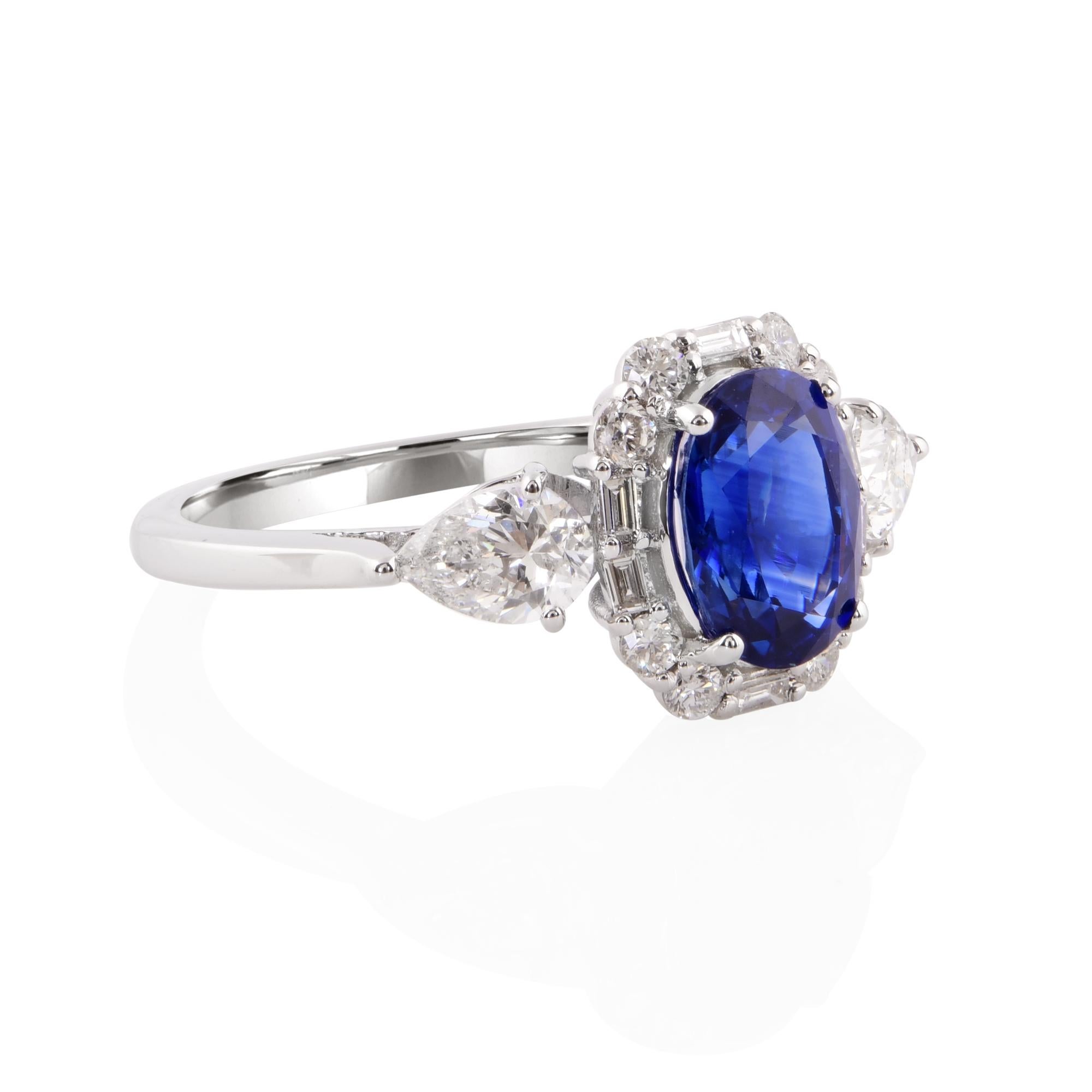 Crafted with precision and attention to detail, this cocktail ring boasts a design that is both elegant and eye-catching. The luminous 18 karat white gold setting provides a radiant backdrop for the gemstones, enhancing their natural beauty and