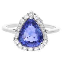Bague en or blanc 18 carats avec saphir bleu de pureté SI et diamant de couleur hi-colore