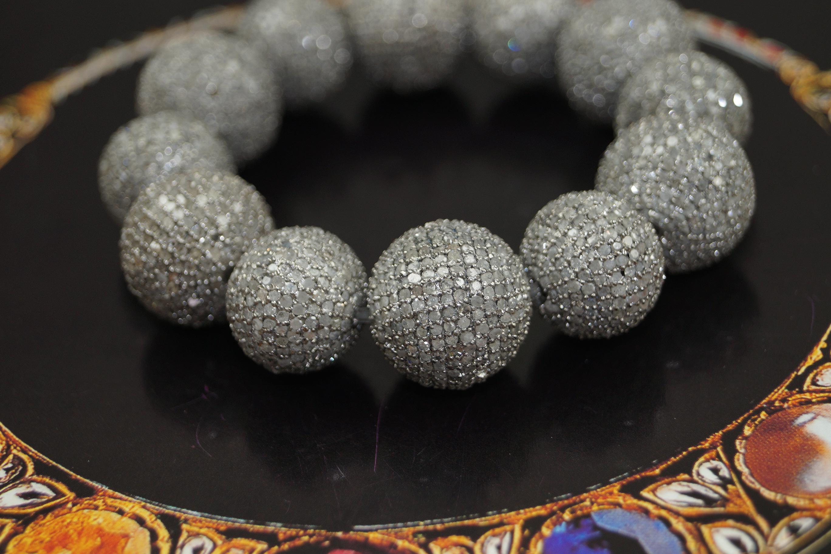 Adorn your wrist with timeless sophistication and understated glamour with our exquisite pave diamonds sterling silver bead ball bracelet. Each bead ball on this elegant bracelet is meticulously crafted from lustrous sterling silver, boasting an