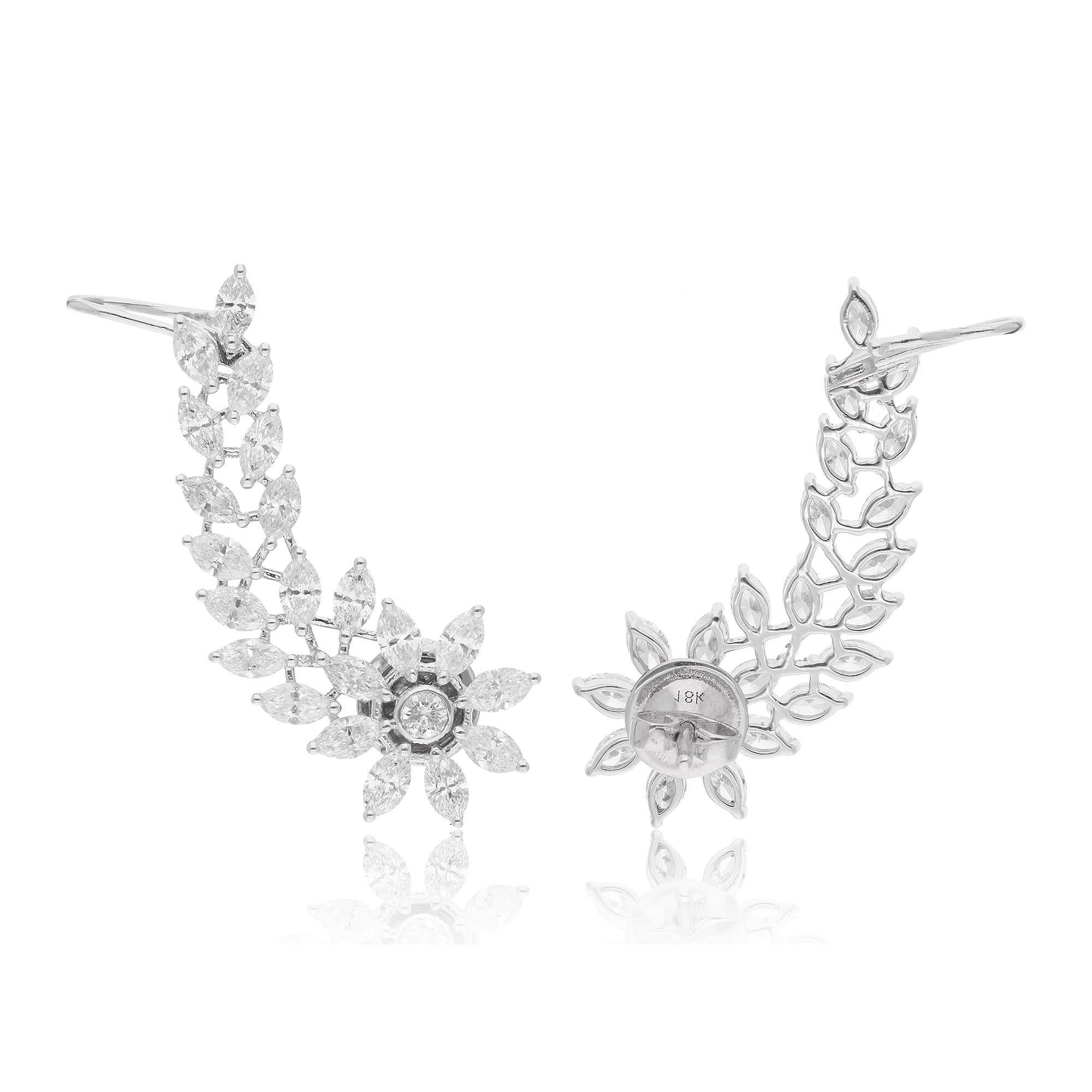 Experience the enchanting beauty of nature with these exquisite Real Marquise & Round Diamond Leaf Shaped Ear Cuff Earrings, meticulously crafted in lustrous 18 Karat White Gold. Each earring is a stunning embodiment of organic elegance and timeless