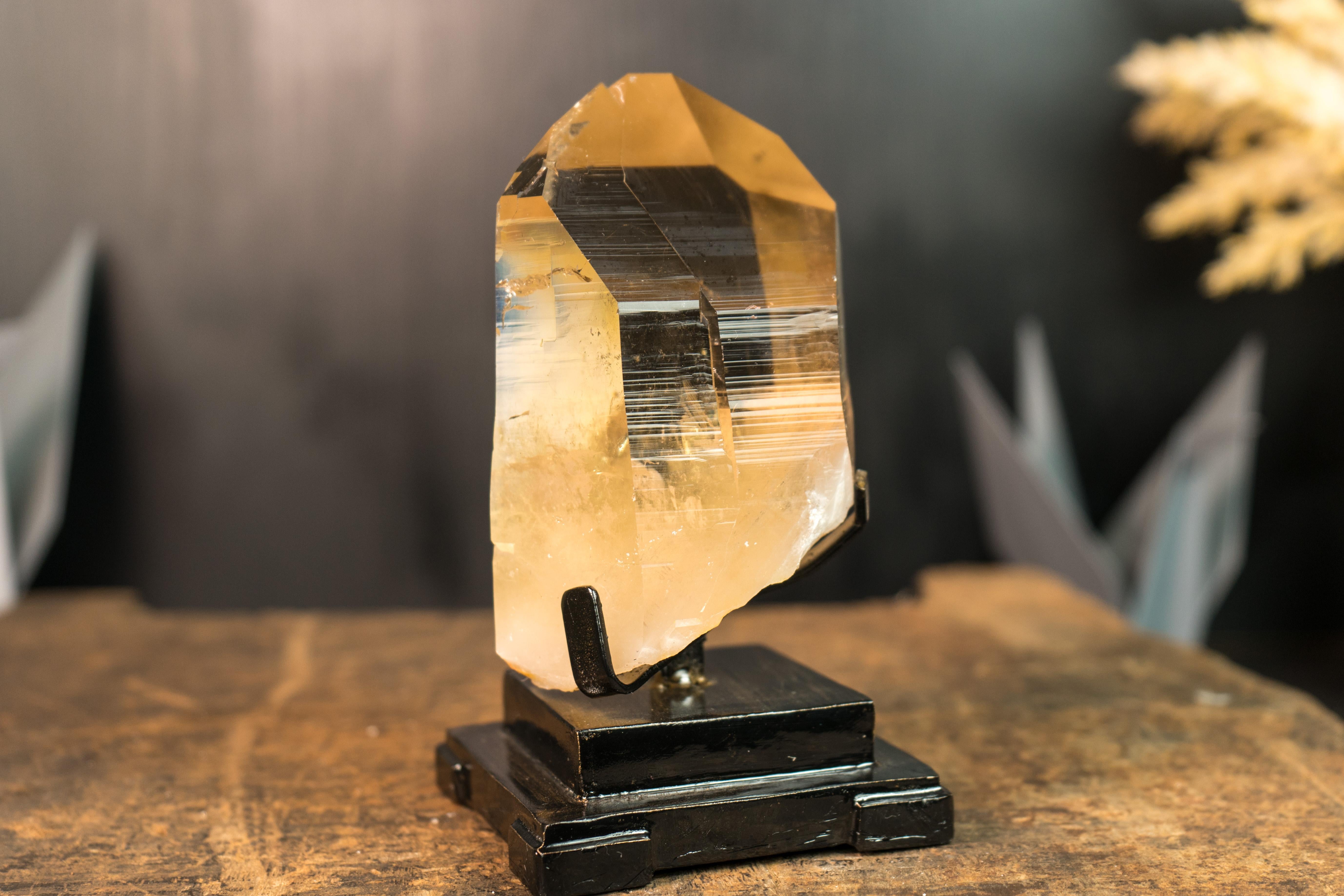 Real Water Clear Golden Orange Citrine, A Natural Citrine of Exceptional Beauty

▫️ Description

A spectacular specimen from the famous mines of Araçuaí, Brazil, this Natural Citrine brings unparalleled beauty It is a rare creation from Nature with
