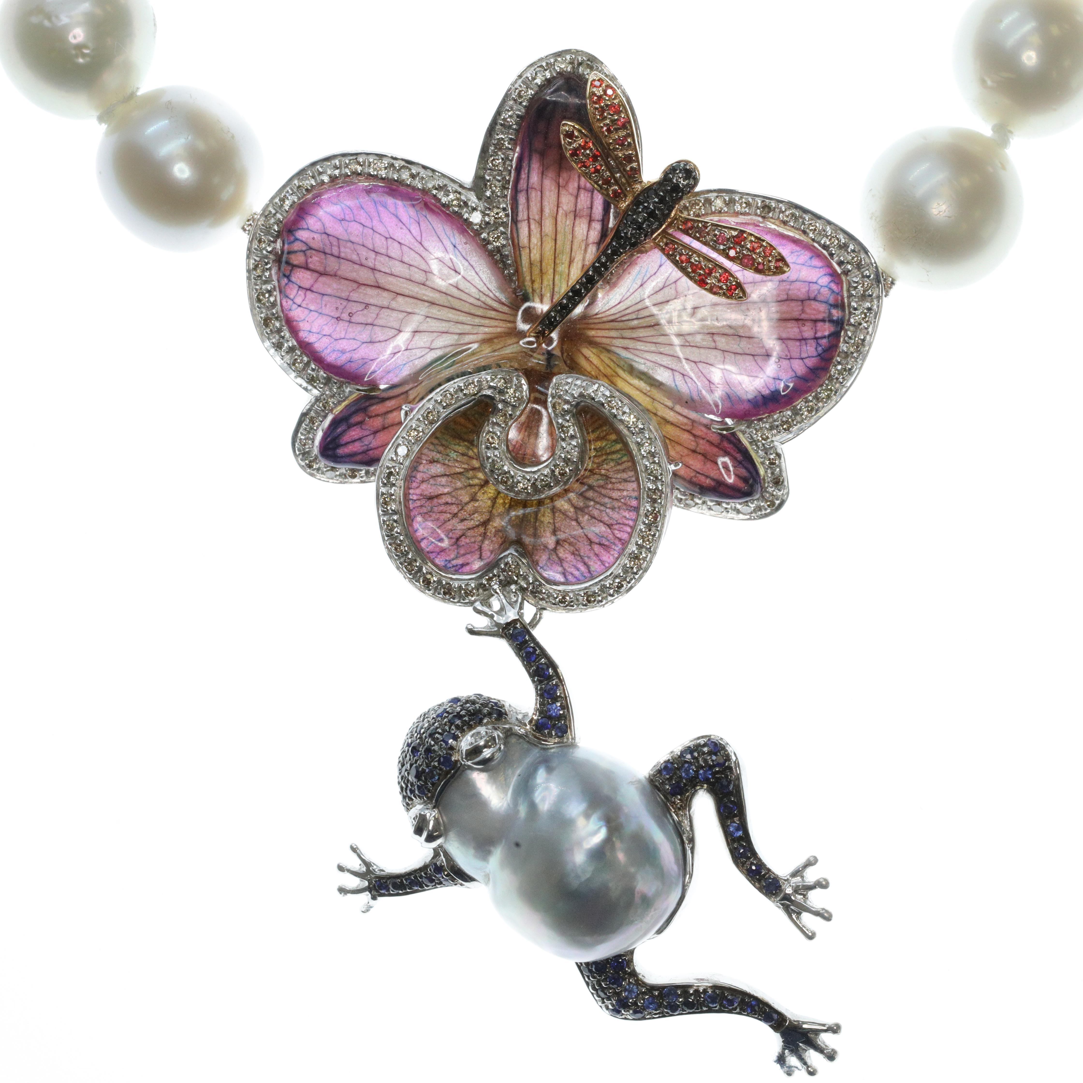 This is a gorgeous collar necklace made from Australian pearls completed by a large flower, dragonfly and leaping frog pendant. Made from the real bloom of a stunning mauve orchid -- caught at its most vibrant and beautiful, and preserved in a