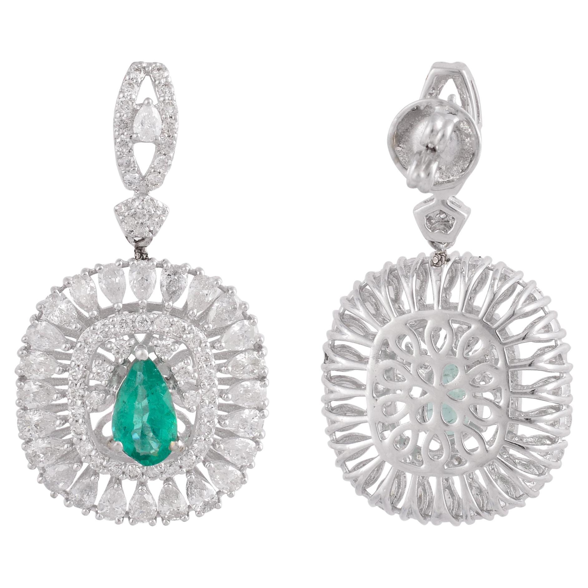 Item Code :- CN-21891A
Gross Wt. :- 11.30 gm
18k White Gold Wt. :- 10.15 gm
Diamond Wt. :- 4.40 Ct. ( AVERAGE DIAMOND CLARITY SI1-SI2 & COLOR H-I )
Emerald Wt. :- 1.35 Ct.
Earrings Size :- 33.16 x 16.14 mm approx.
✦ Sizing
.....................
We