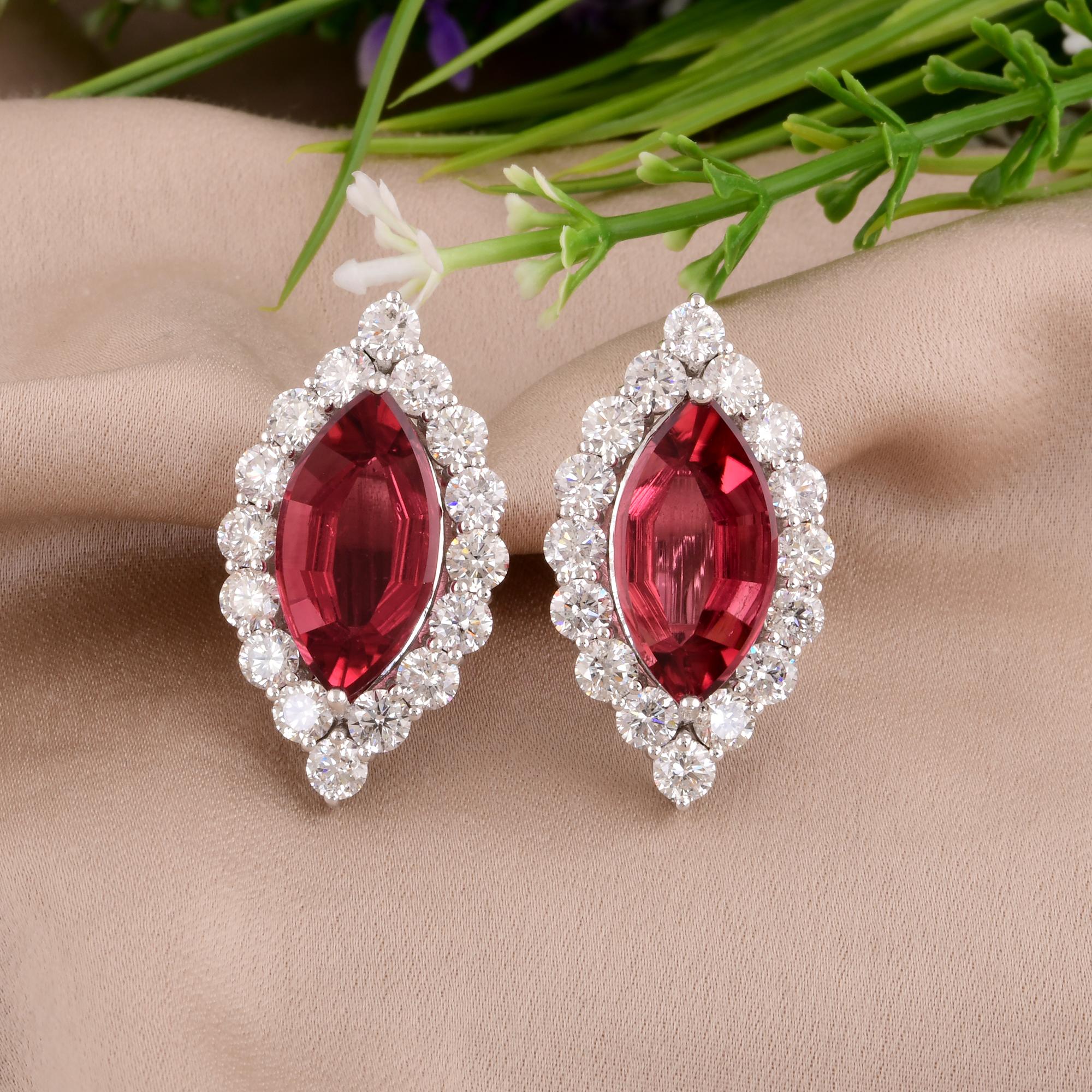These earrings are more than just jewelry; they are a statement of sophistication and refined taste. Each earring features a lustrous, genuine Pink Tourmaline gemstone, meticulously selected for its vibrant hue and captivating brilliance. The Pink