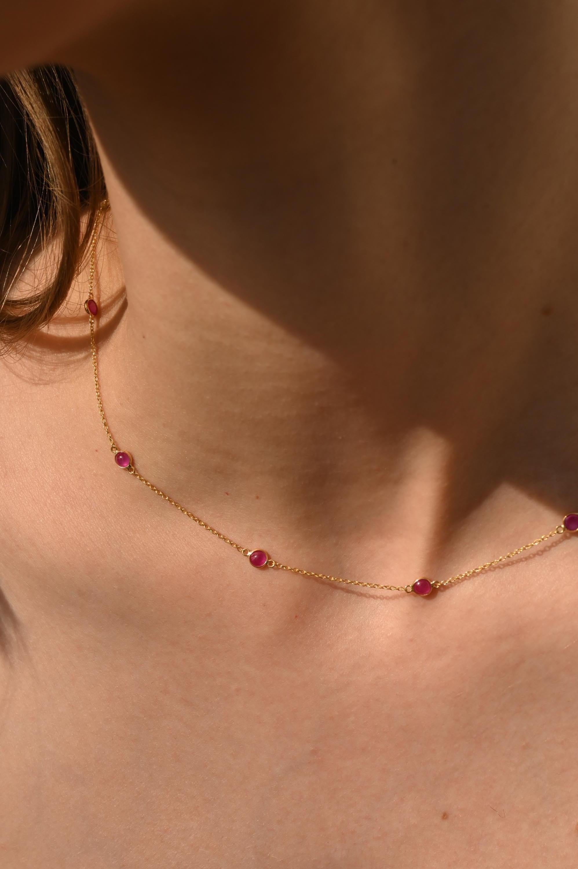 Ruby Station Chain Necklace in 14K Gold studded with round cut ruby. This stunning piece of jewelry instantly elevates a casual look or dressy outfit. 
Ruby improves mental strength. 
Designed with a round cut ruby set in a chain studded around it