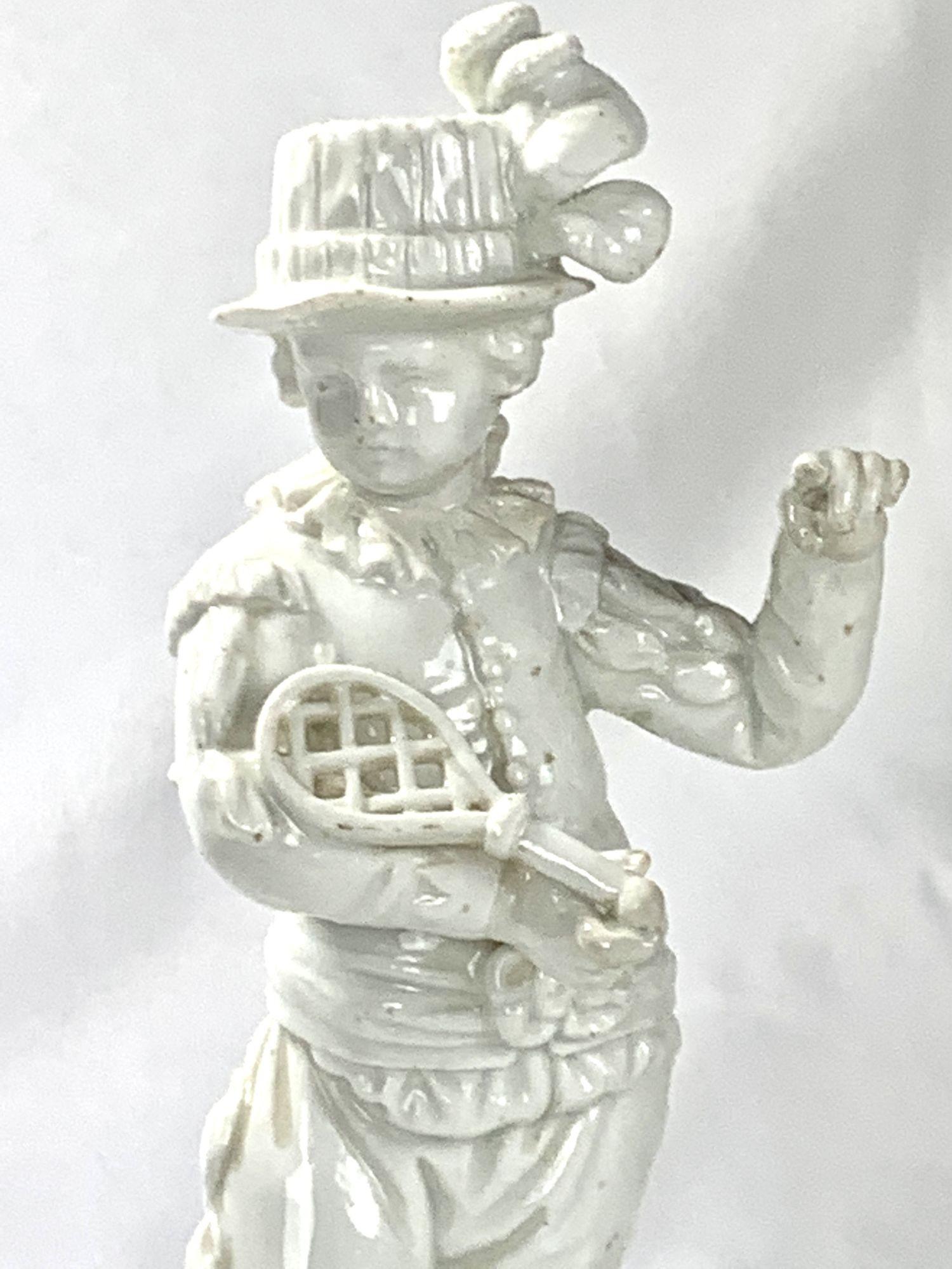 This figure of an elegant young nobleman ready to play Real Tennis was made of German (Saxony) hard-paste porcelain circa 1820.
Real Tennis, a favorite pastime of King Henry The Eighth of England, is also known as the Sport of Kings*
The young man