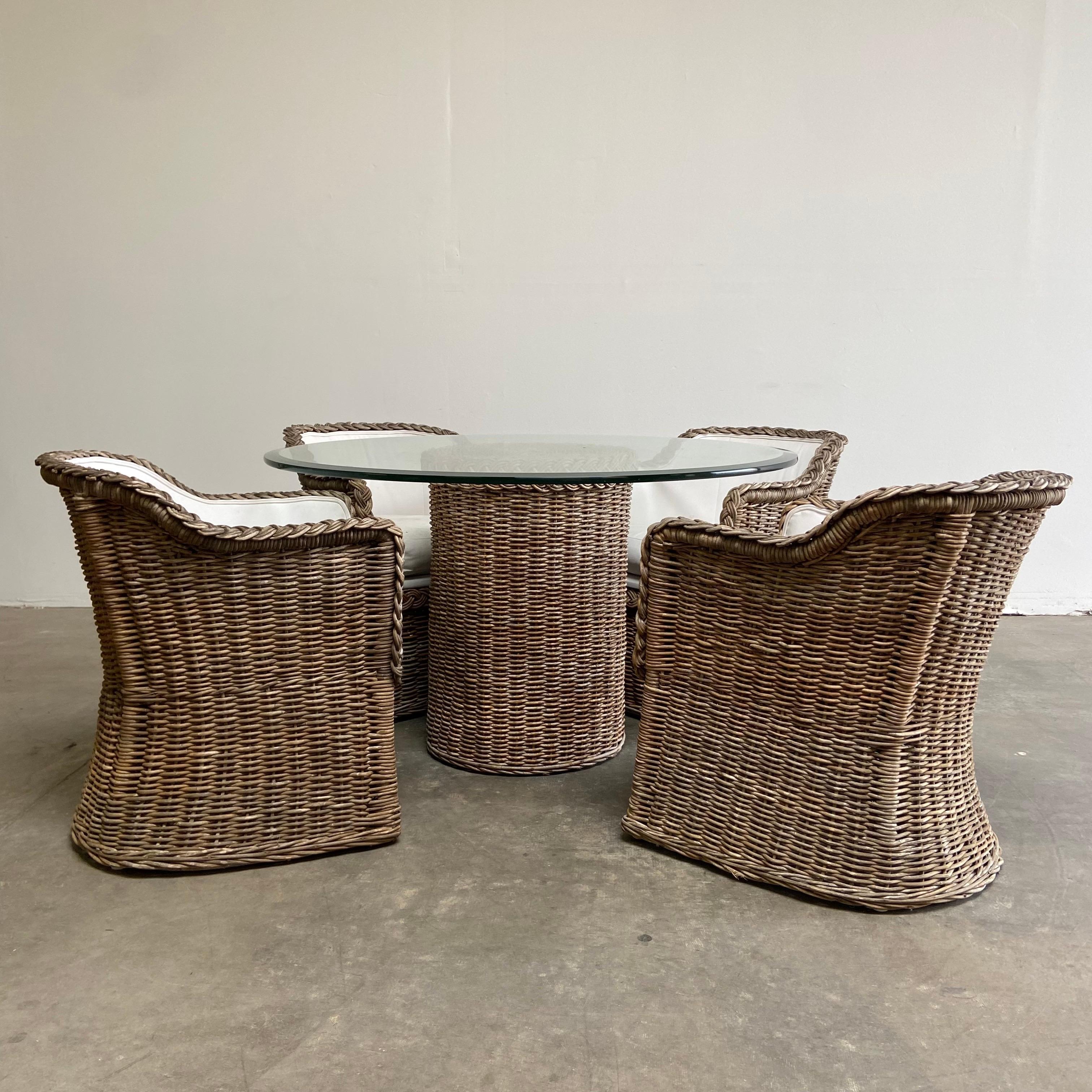 5 pc. Rattan patio dinette set 
Table: 48”rd. X 28-1/2”h
Chairs: 23”w x 26”d x 29”h
SH:19”. SD:20” AH:25”
Overall in good condition. RL Outdoor patio set upholstered in white sunbrella, this sunbrella has heavy use, with stains and other markings.