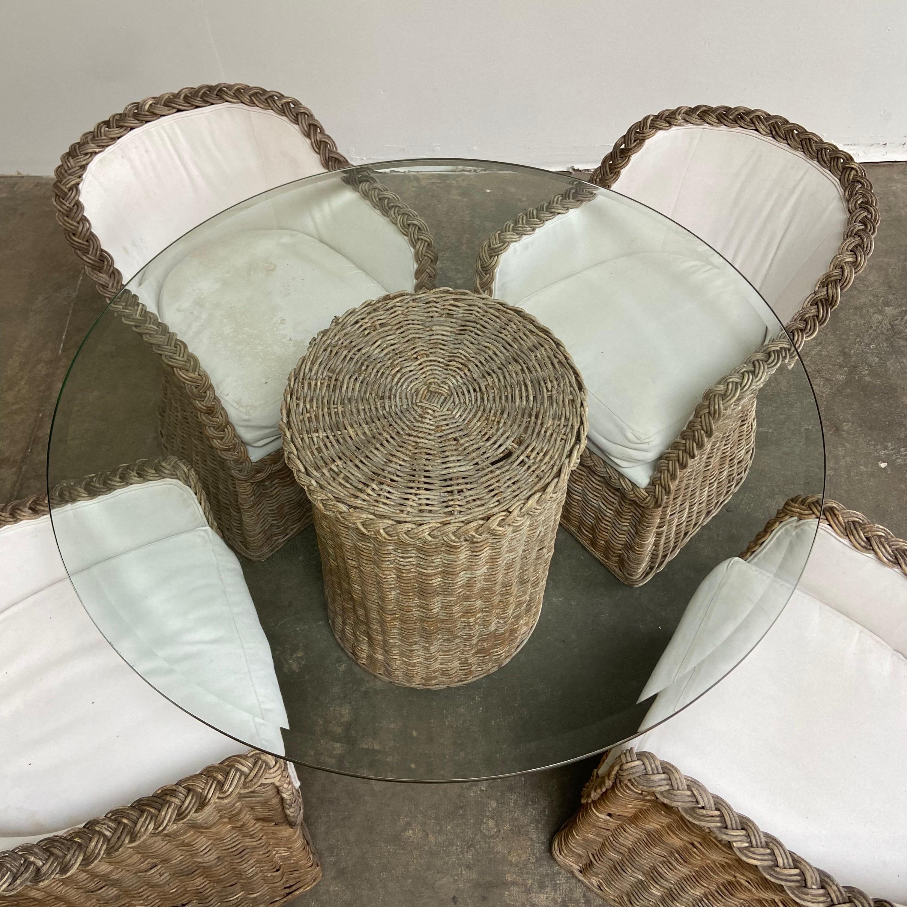 round wicker patio table with glass top