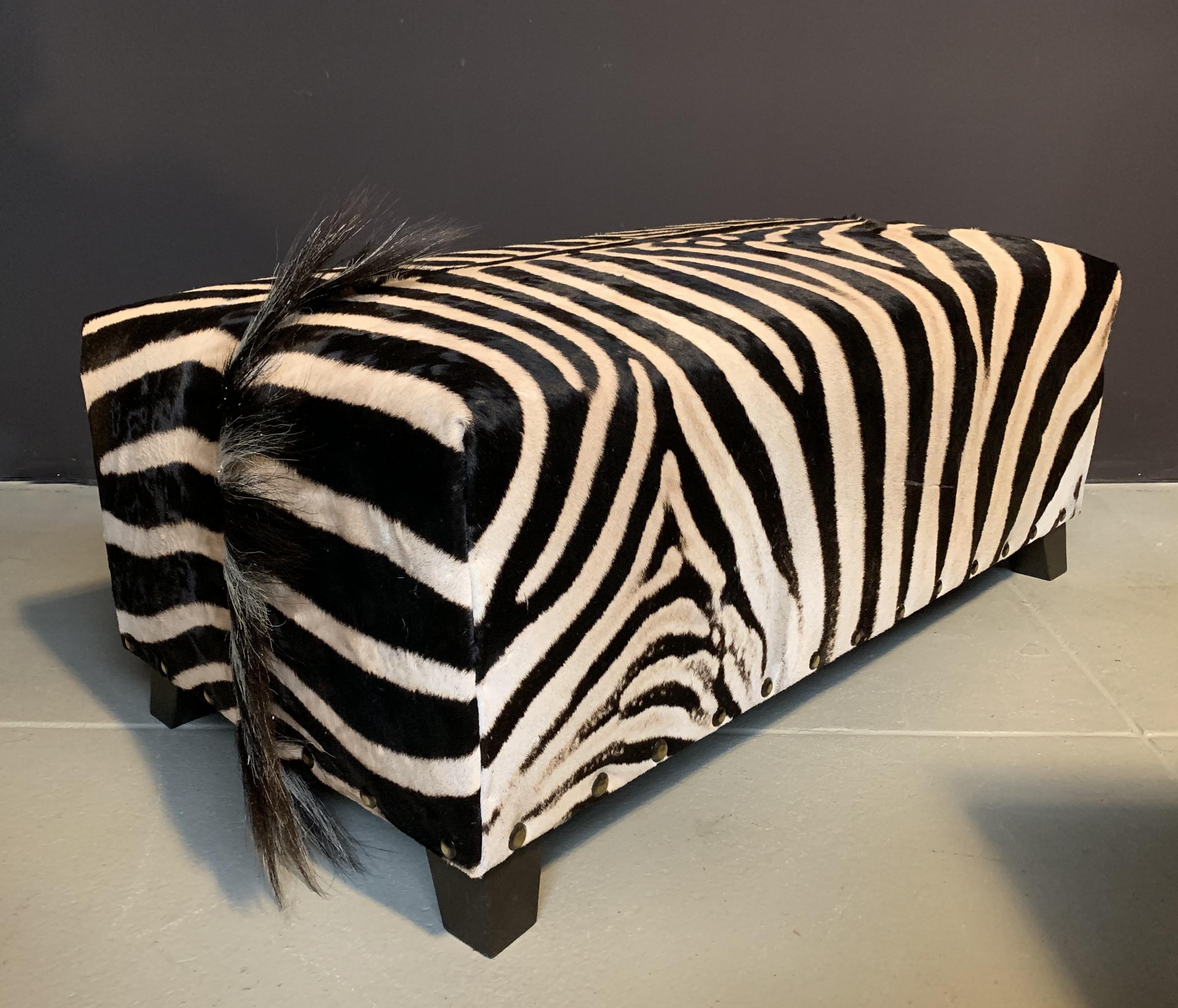 A very nice and decorative ottoman made from a real Burchell zebra skin.
This ottoman is from a high quality.
Zebras are wild animals so the skin can contain some small scratches.