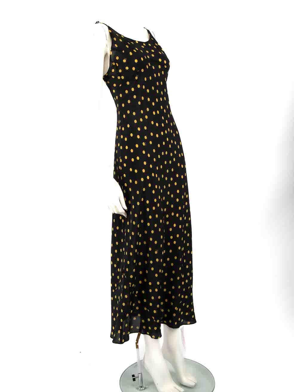 CONDITION is Never worn, with tags. No visible wear to dress is evident on this new Réalisation designer resale item.
 
 
 
 Details
 
 
 Model: The Iggy
 
 Black
 
 Silk
 
 Slip dress
 
 Yellow polkadot pattern
 
 Sleeveless
 
 Midi
 
 Adjustable
