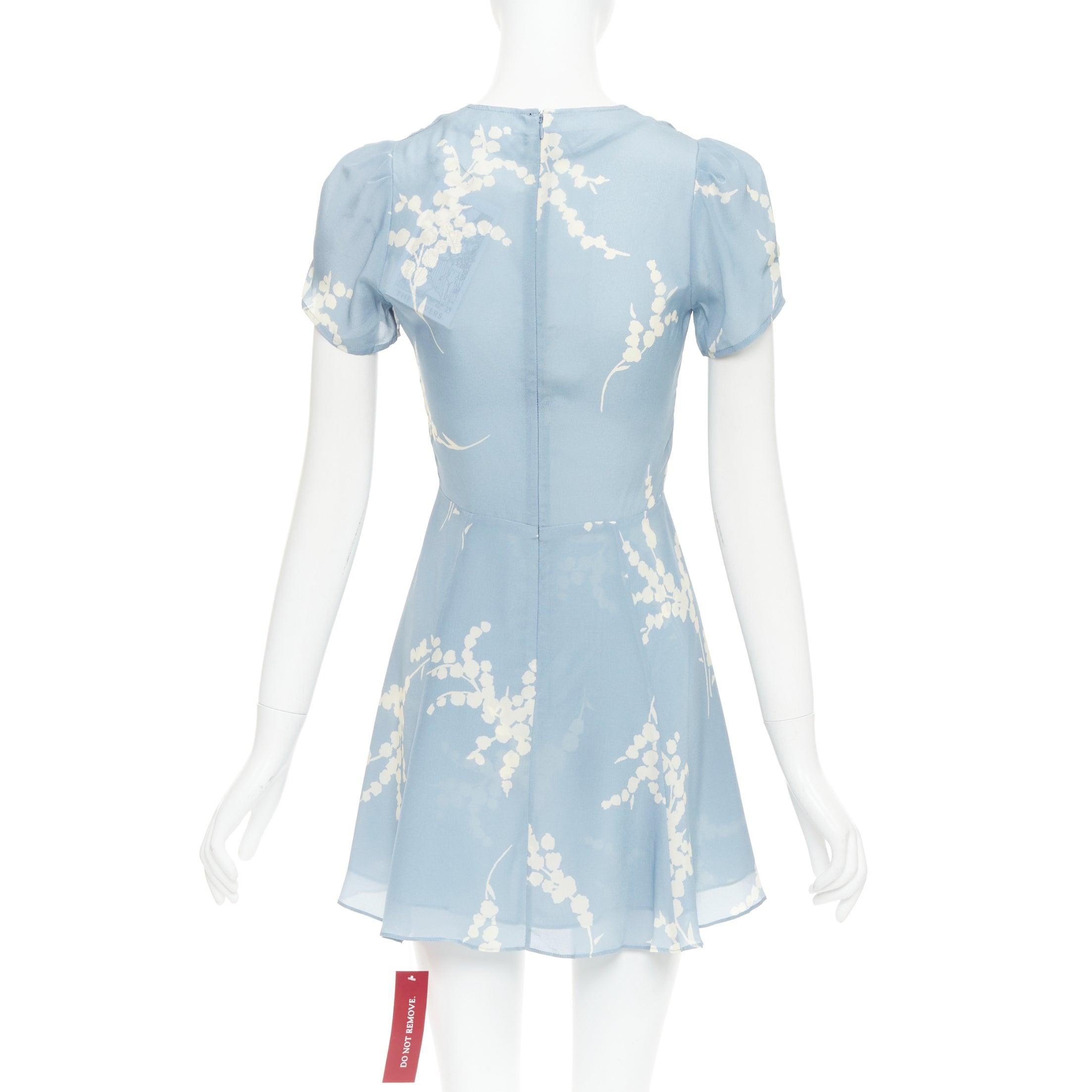 Donna REALISATION Luella, prendisole con scollo a V in 100% seta azzurro crema e stampa floreale XS in vendita