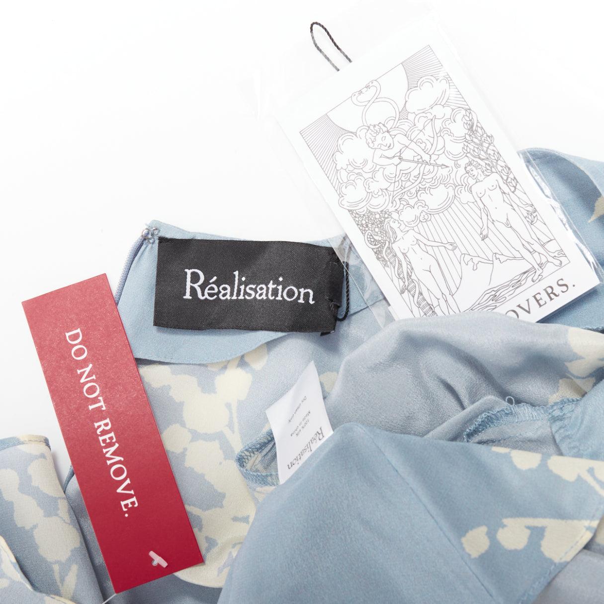 REALISATION Luella, prendisole con scollo a V in 100% seta azzurro crema e stampa floreale XS in vendita 3
