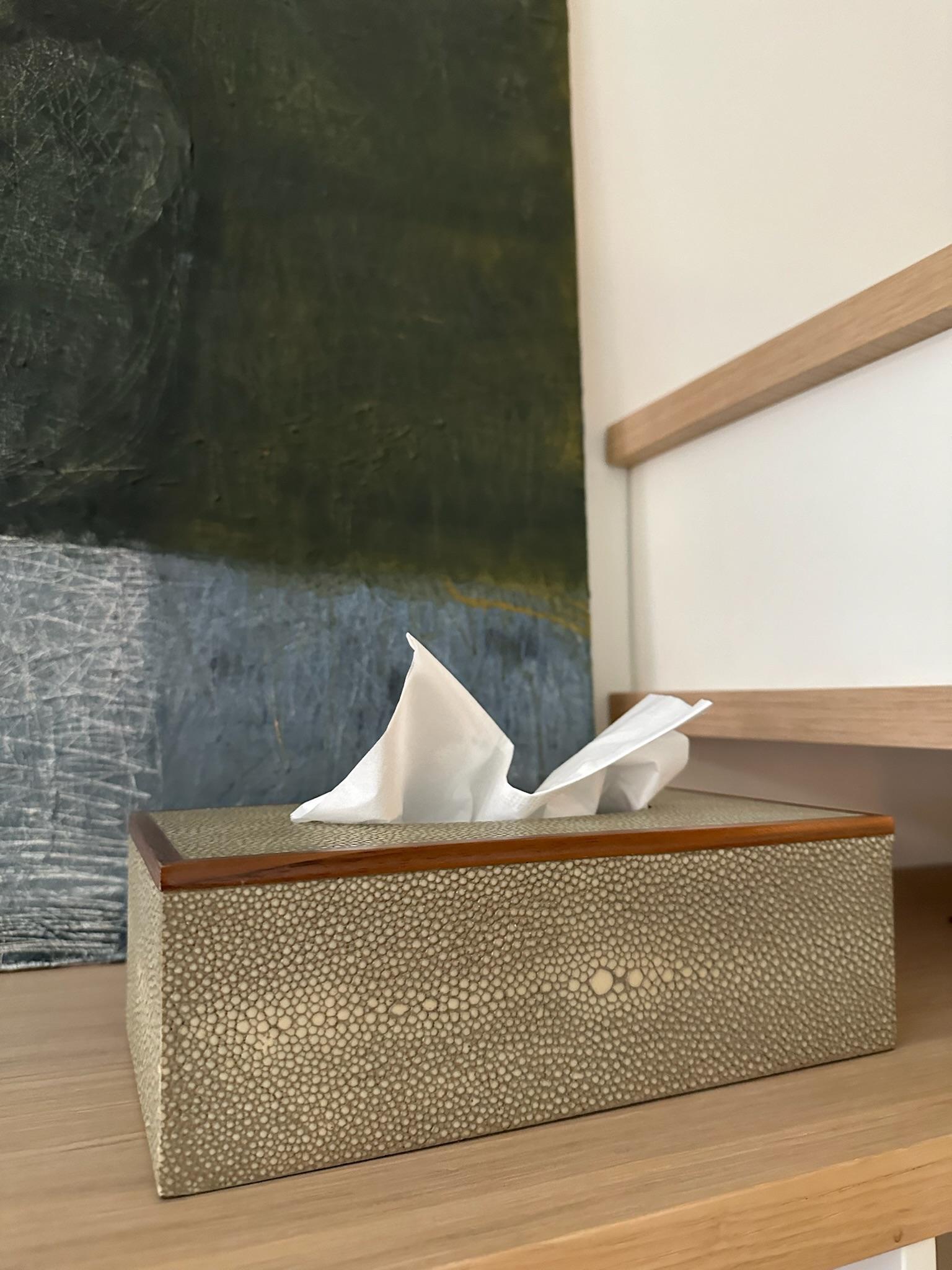 The outer sides of the tissue box are beautifully crafted to mimic the natural eye pattern of shagreen, topped with a veneer trim.