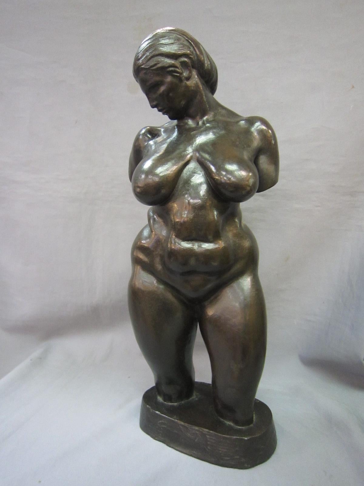 A fabulous original bronze sculpture of a voluptuous nude woman standing,
signed Brenda Putnam 1928, Kunst foundry 
This statue of a nude torso sculpted by a highly skilled female sculptor, displays a sense of grace and beauty. The soft curves of