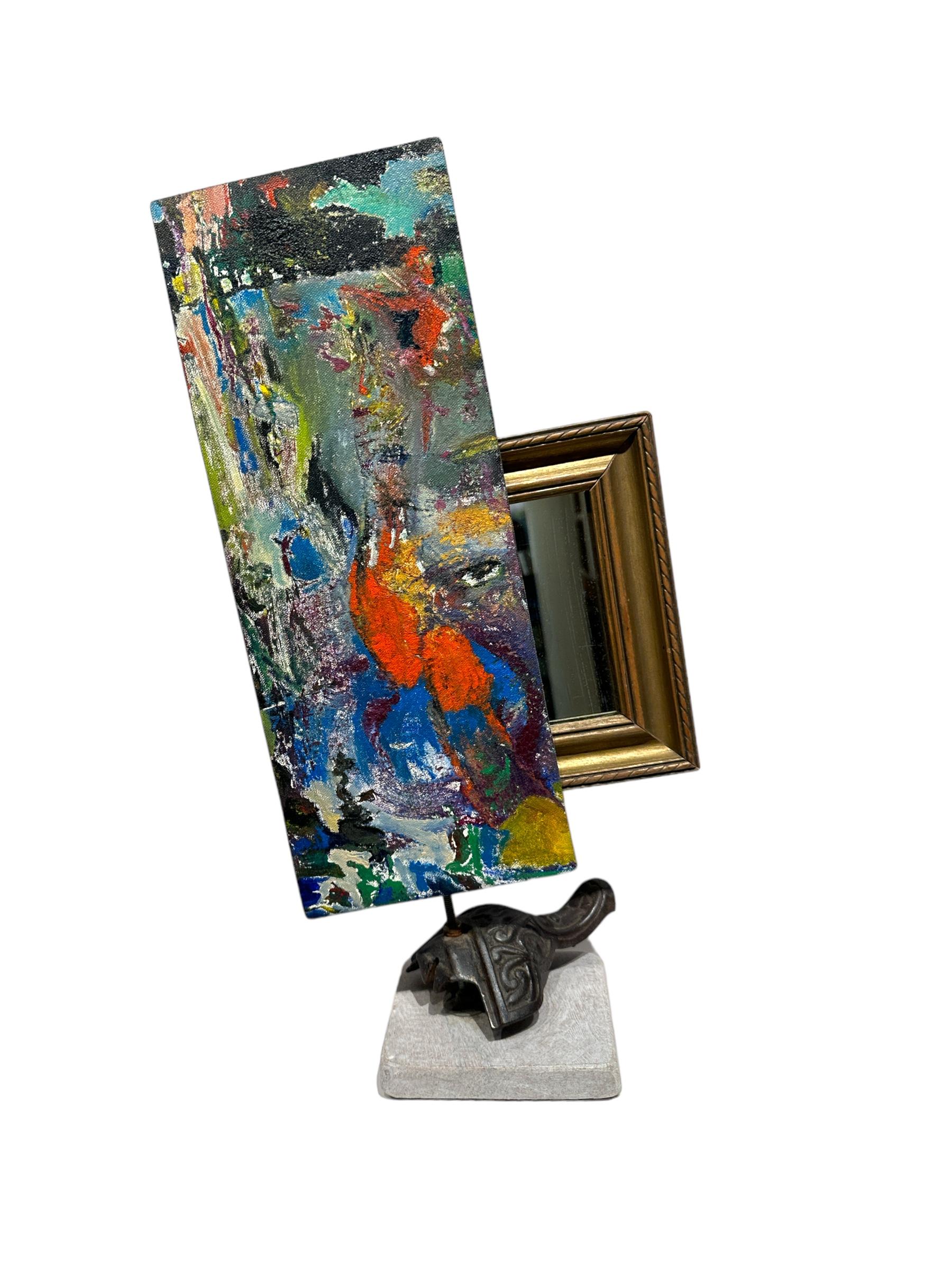 Self-taught artist John Seubert, AKA John Dolly, repurposes objects he uncovers as he rehabs older homes in Chicago. Here, a framed mirror is hinged to the back of a small abstract painting. When 