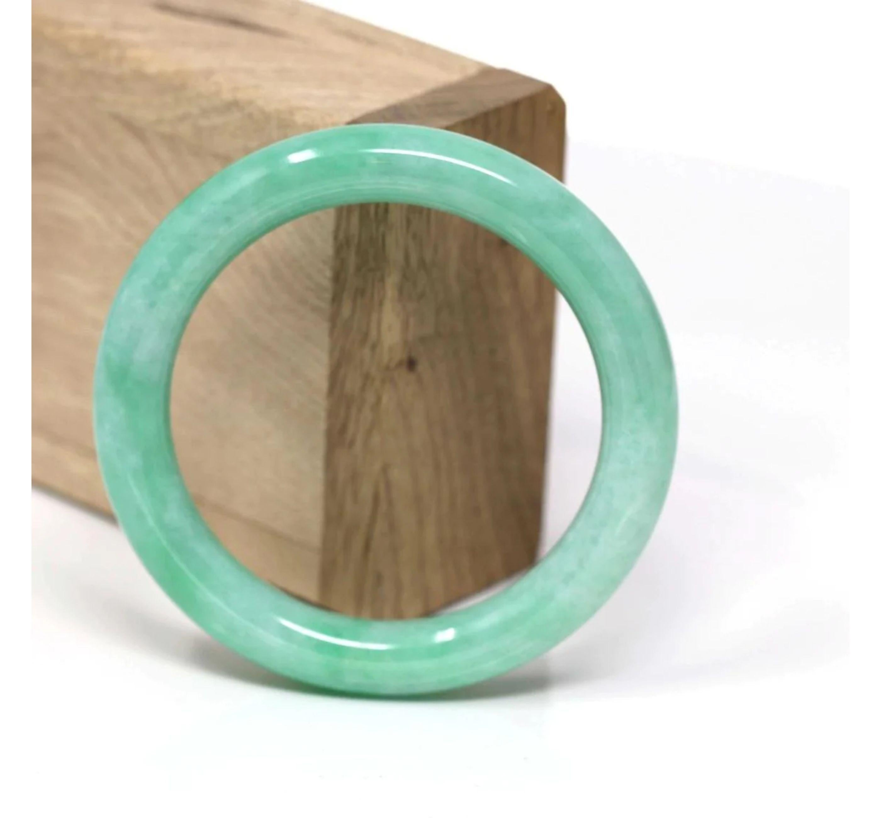 DETAILS--- Genuine Burmese Jadeite Jade Bangle Bracelet. This bangle is made with high-quality genuine Burmese Vibrant Green Jadeite jade, The jade texture is so translucent with apple green color inside. The green color and translucent white